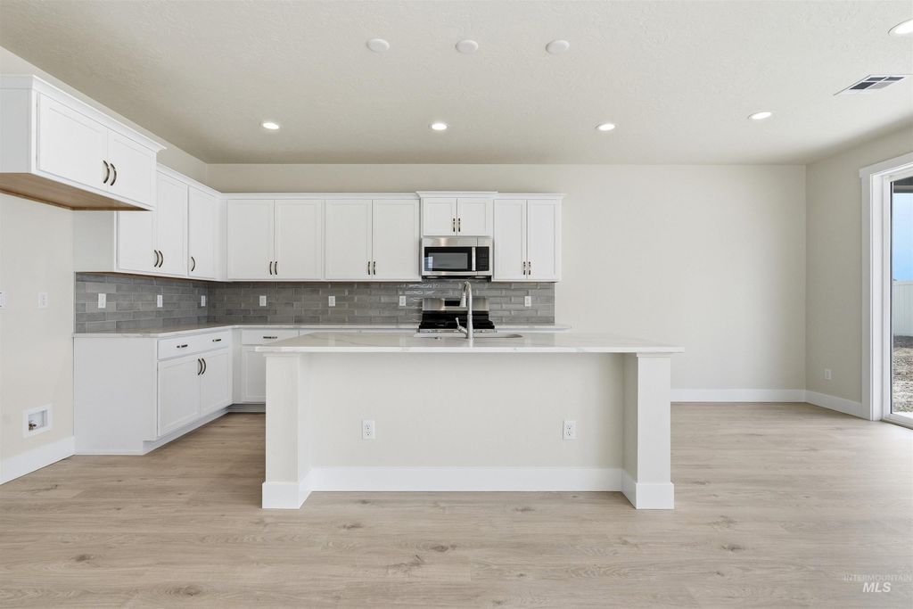 Photo of 5591 W Aralia Dr, Meridian, ID 83646 (MLS # 98982584)