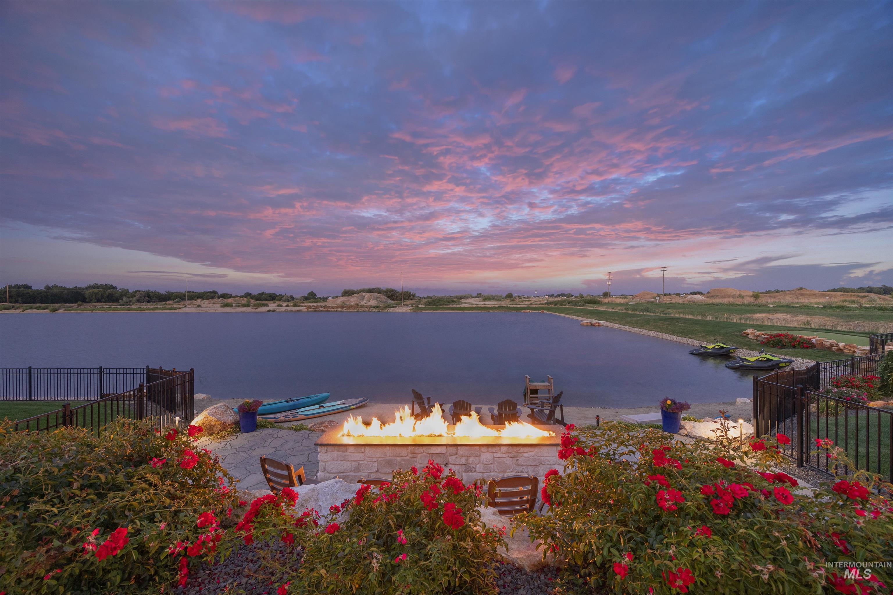 Water view with a fire pit