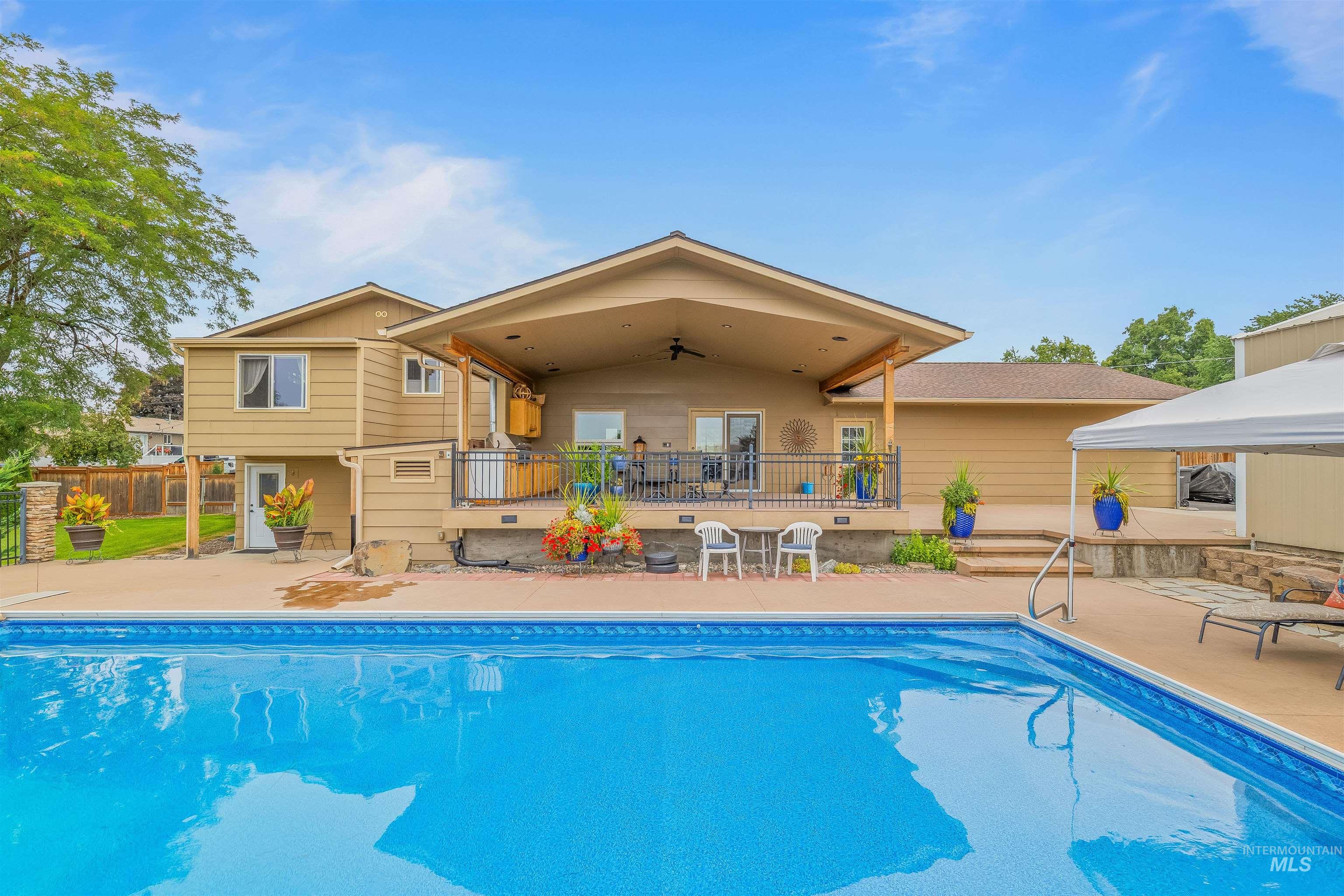 View of swimming pool featuring a patio