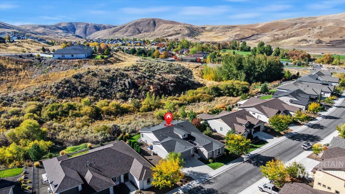 Aerial perspective of suburban area featuring mountains