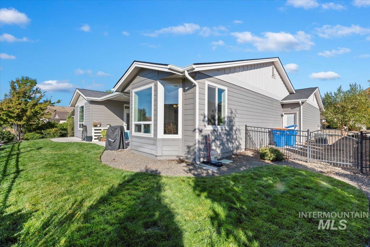 Back of house with board and batten siding
