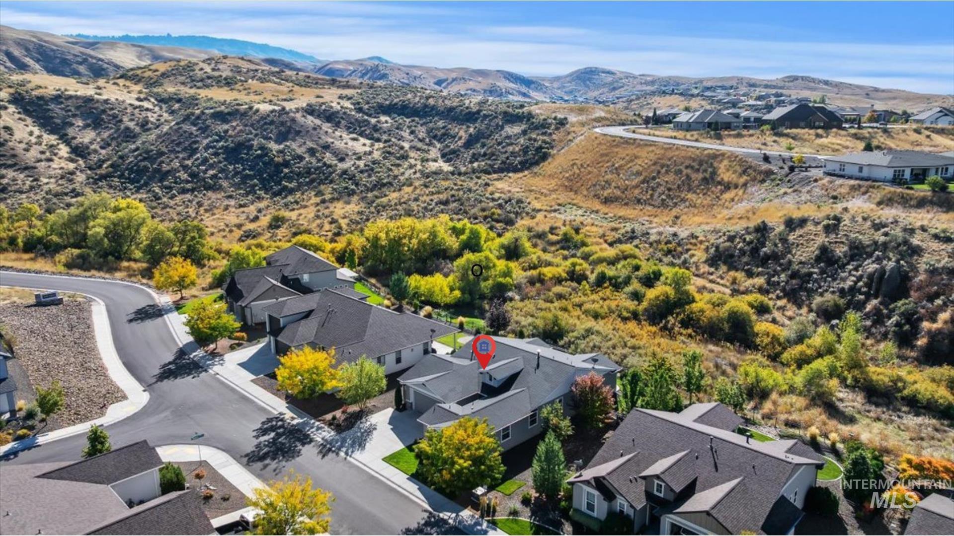 Aerial perspective of suburban area with mountains