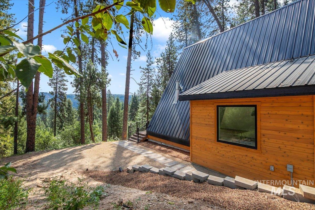 View of home's exterior featuring a metal roof