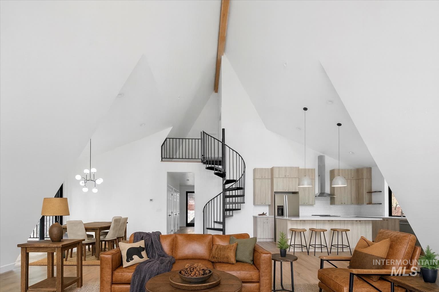 Living area featuring light wood-type flooring, high vaulted ceiling, stairs, beam ceiling, and a chandelier