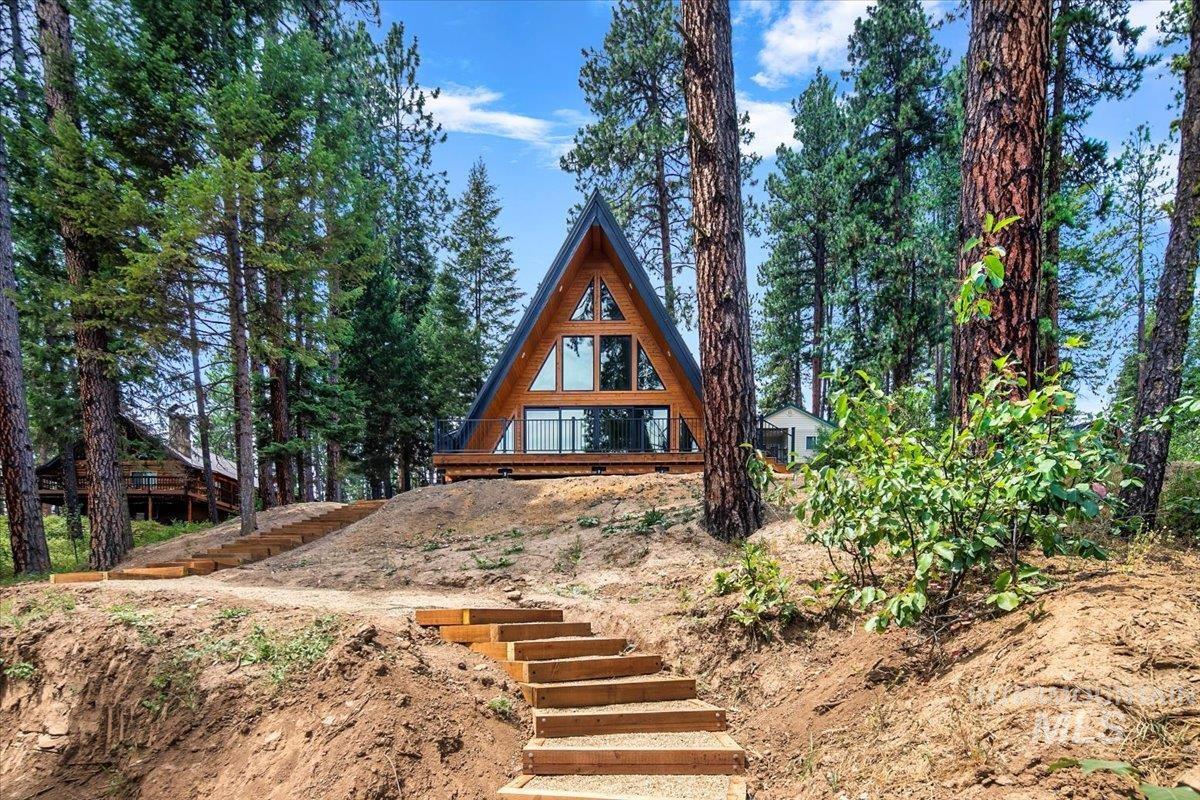 View of front of property with stairway