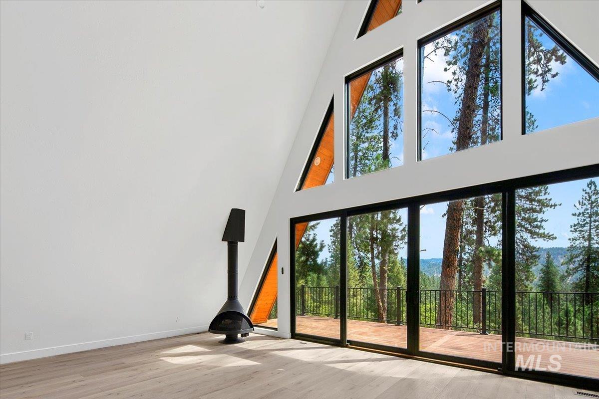 Interior space with wood finished floors and baseboards