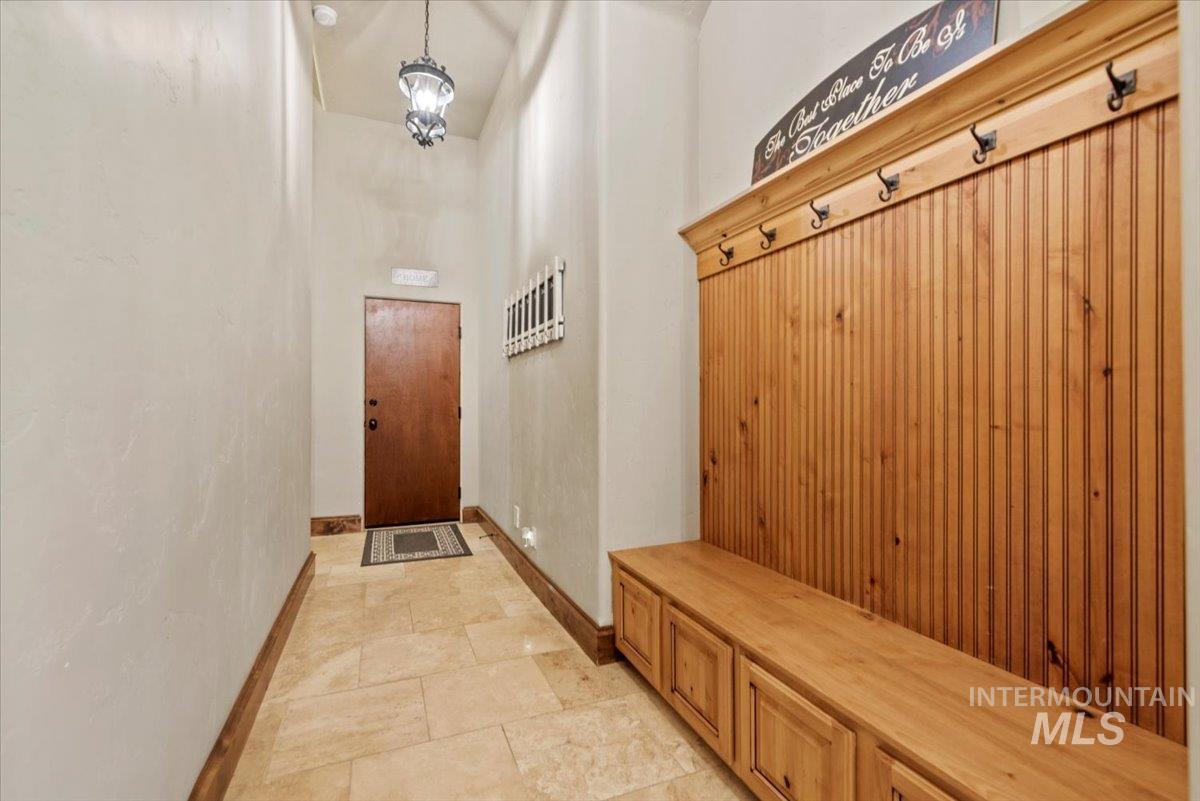 Mudroom featuring baseboards