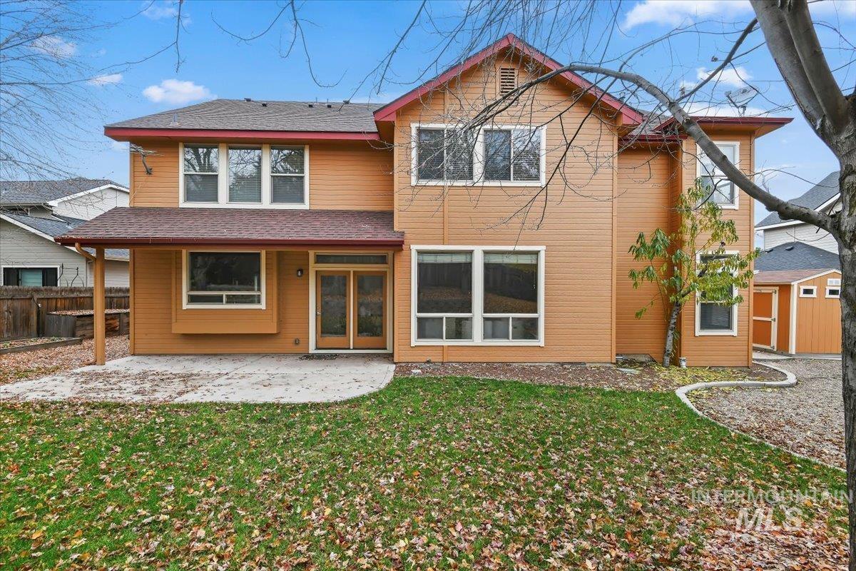 Rear view of house with a patio