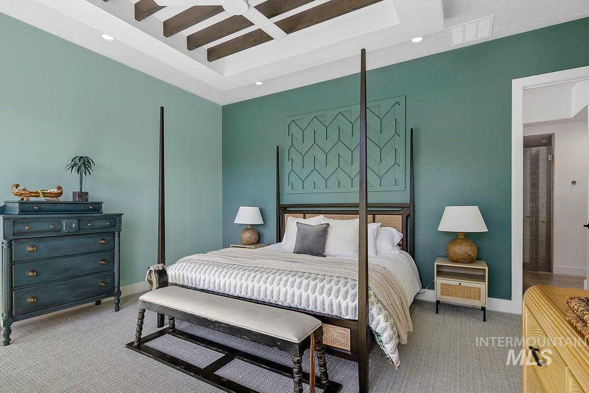 Bedroom featuring beam ceiling, light carpet, recessed lighting, and coffered ceiling