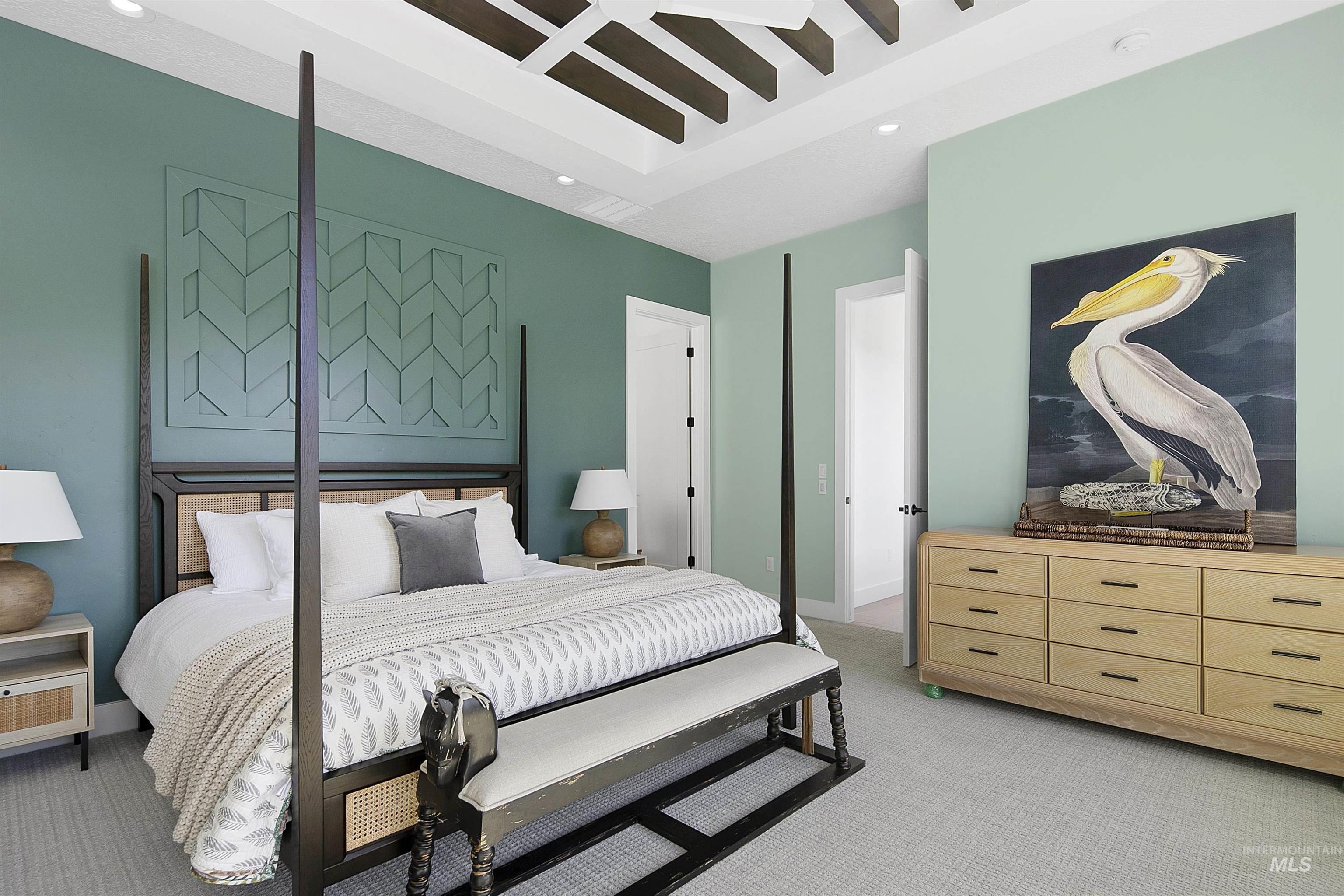 Bedroom featuring light carpet, recessed lighting, and beamed ceiling