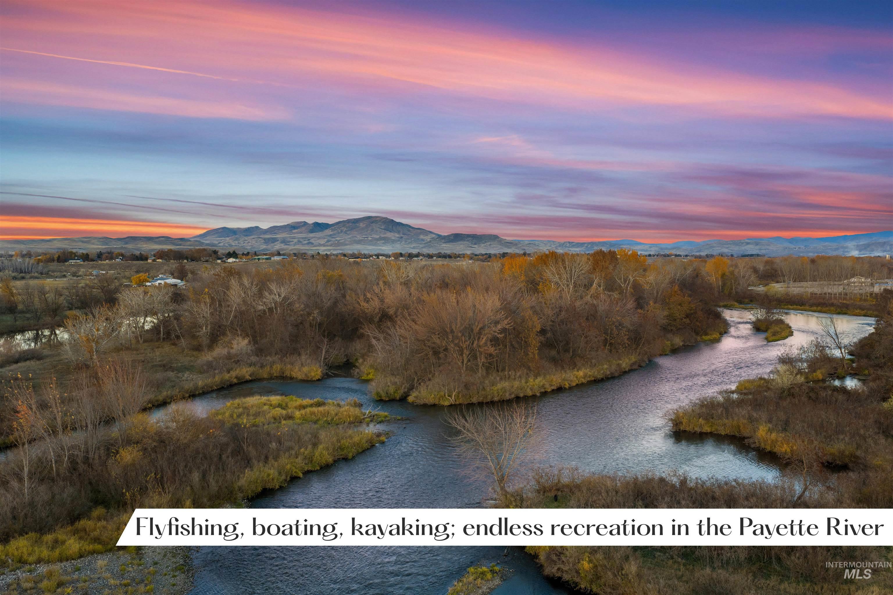 Aerial view at dusk of a water and mountain view
