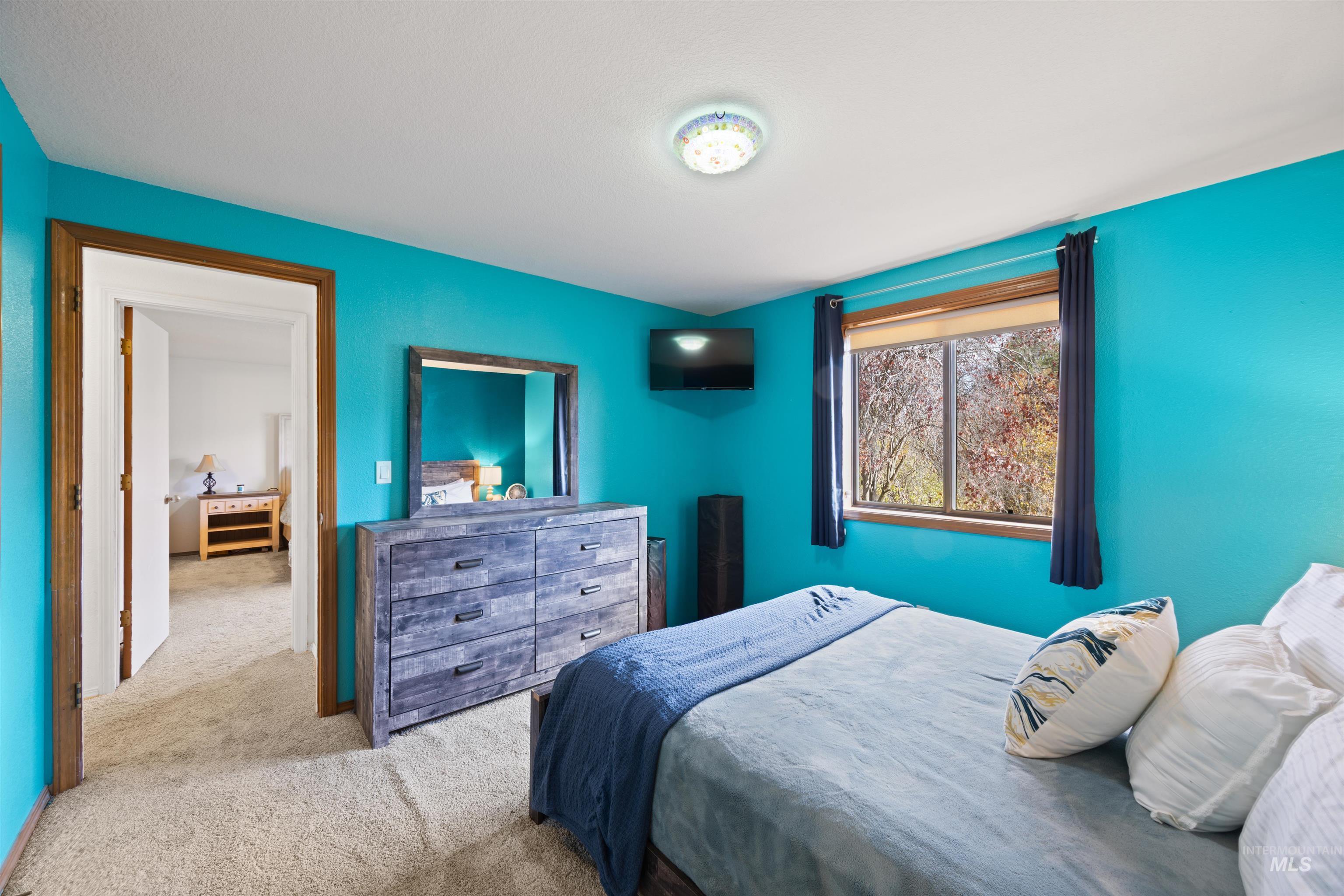 Bedroom featuring carpet floors