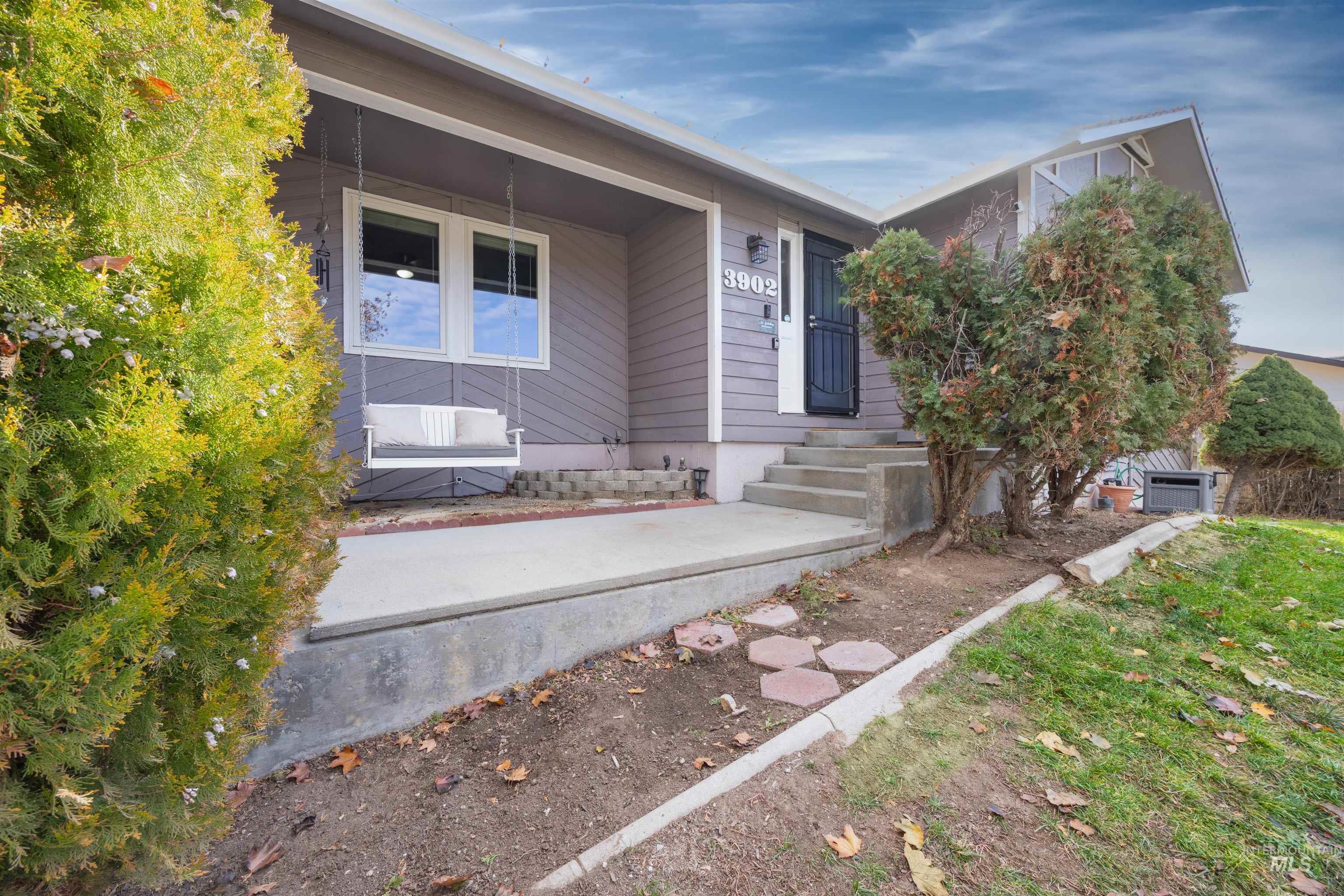 Entrance to property featuring a porch