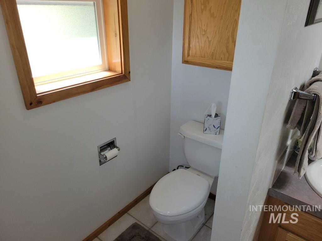 Bathroom featuring vanity and tile patterned floors
