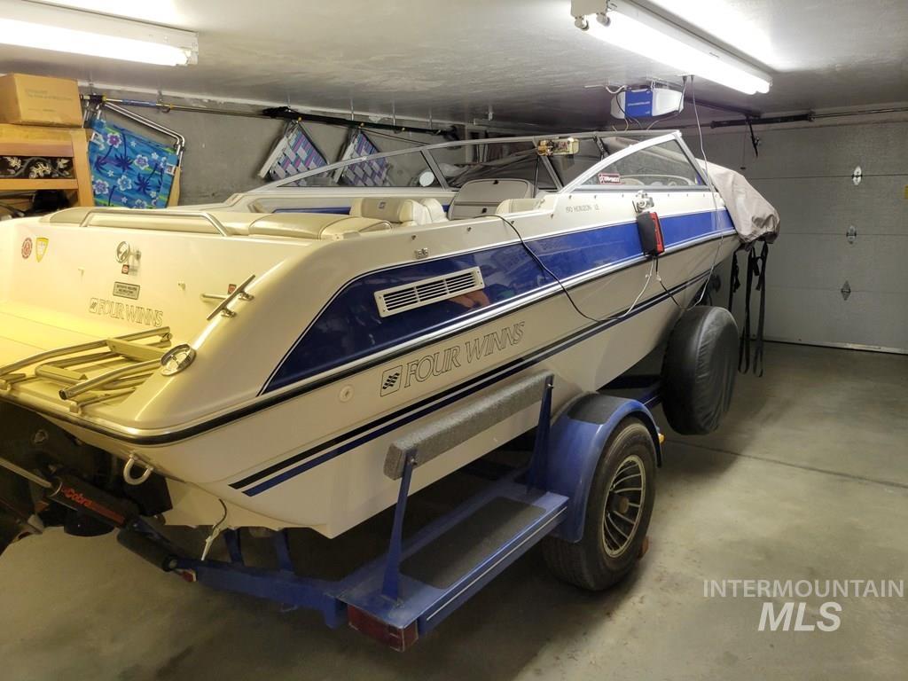 Garage featuring a garage door opener