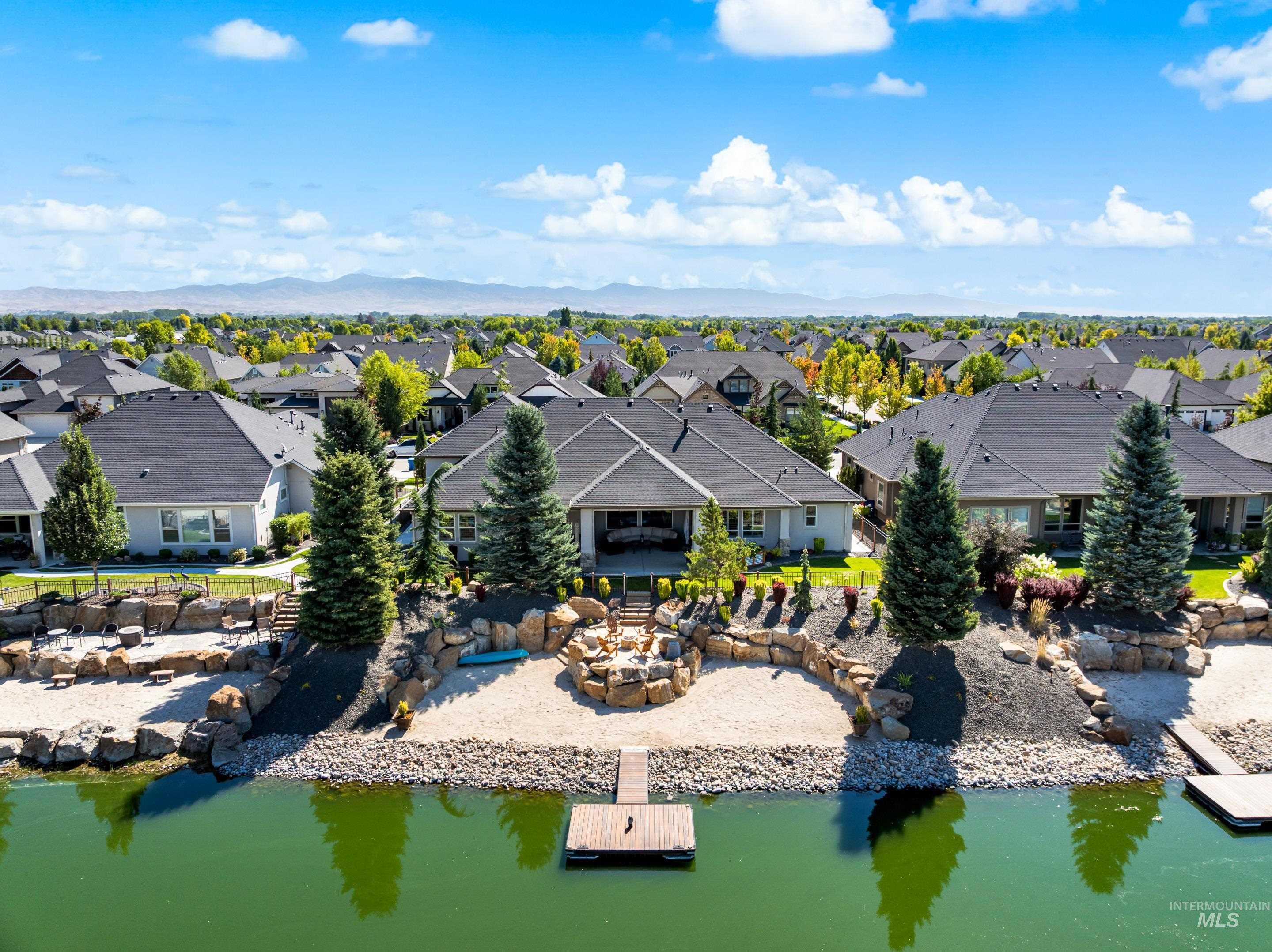 Aerial view of residential area with a nearby body of water