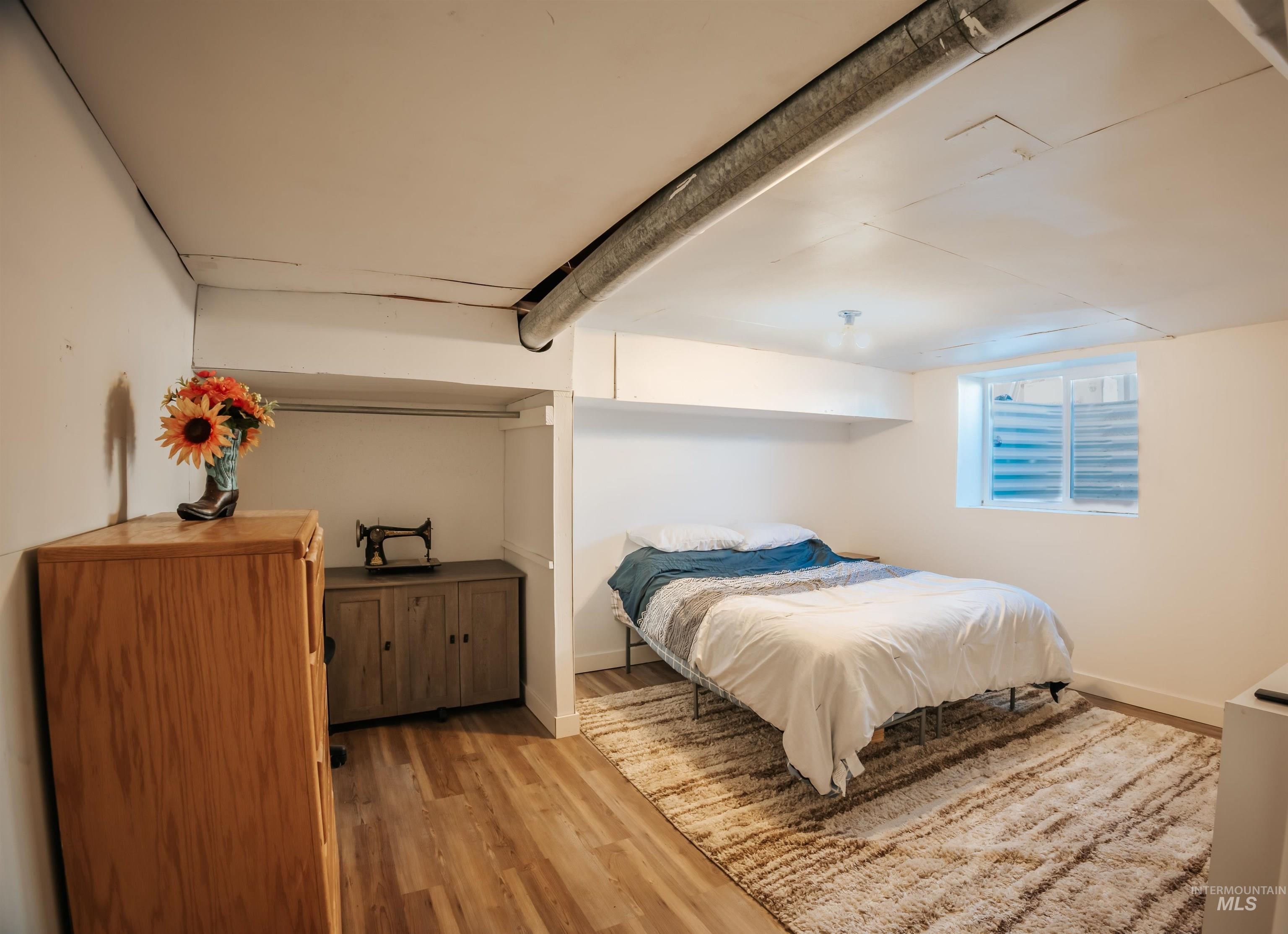 Bedroom featuring light wood-style flooring