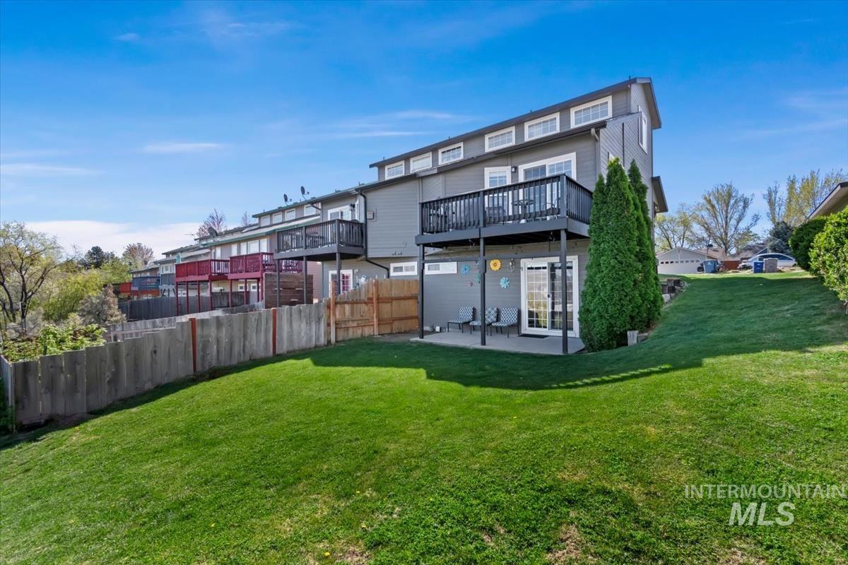 Back of property featuring a patio