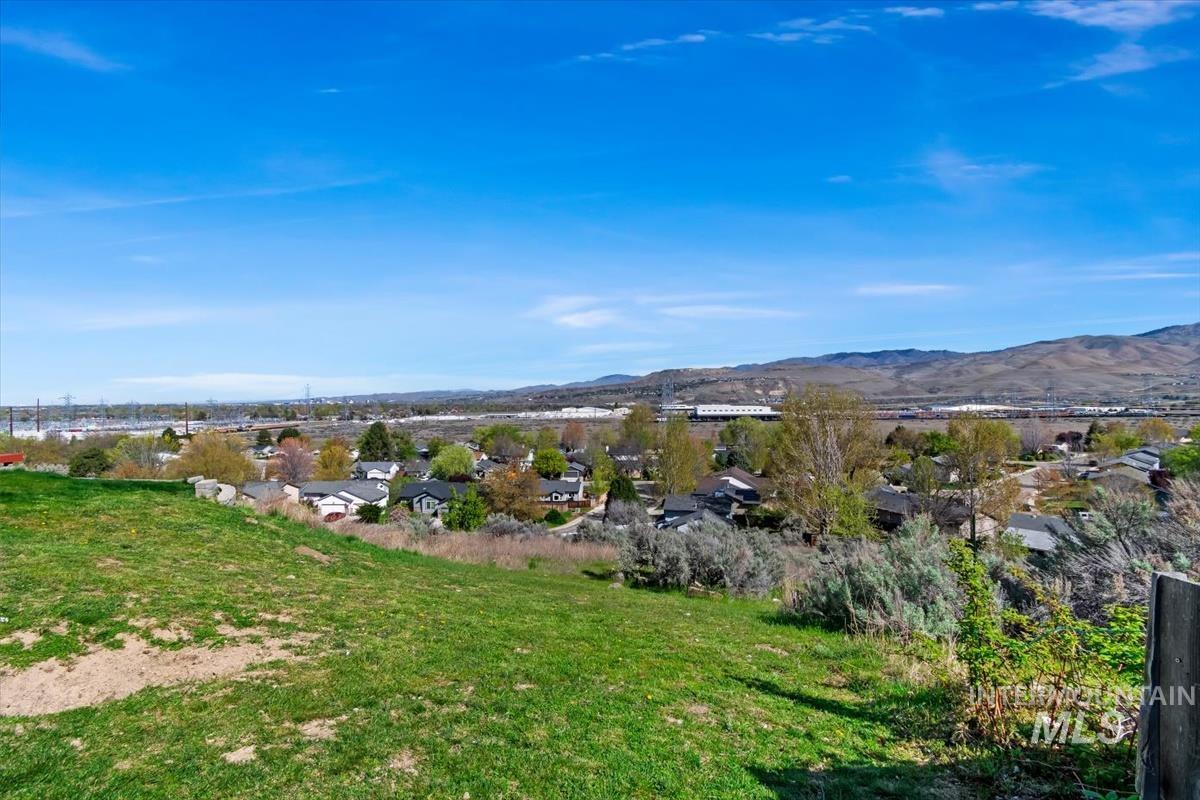 Mountain view featuring nearby suburban area
