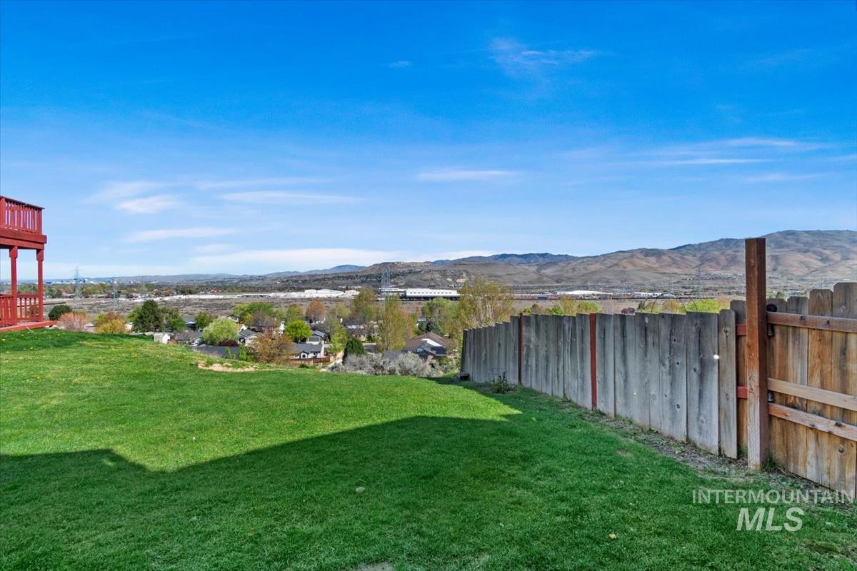 View of yard with a mountain view