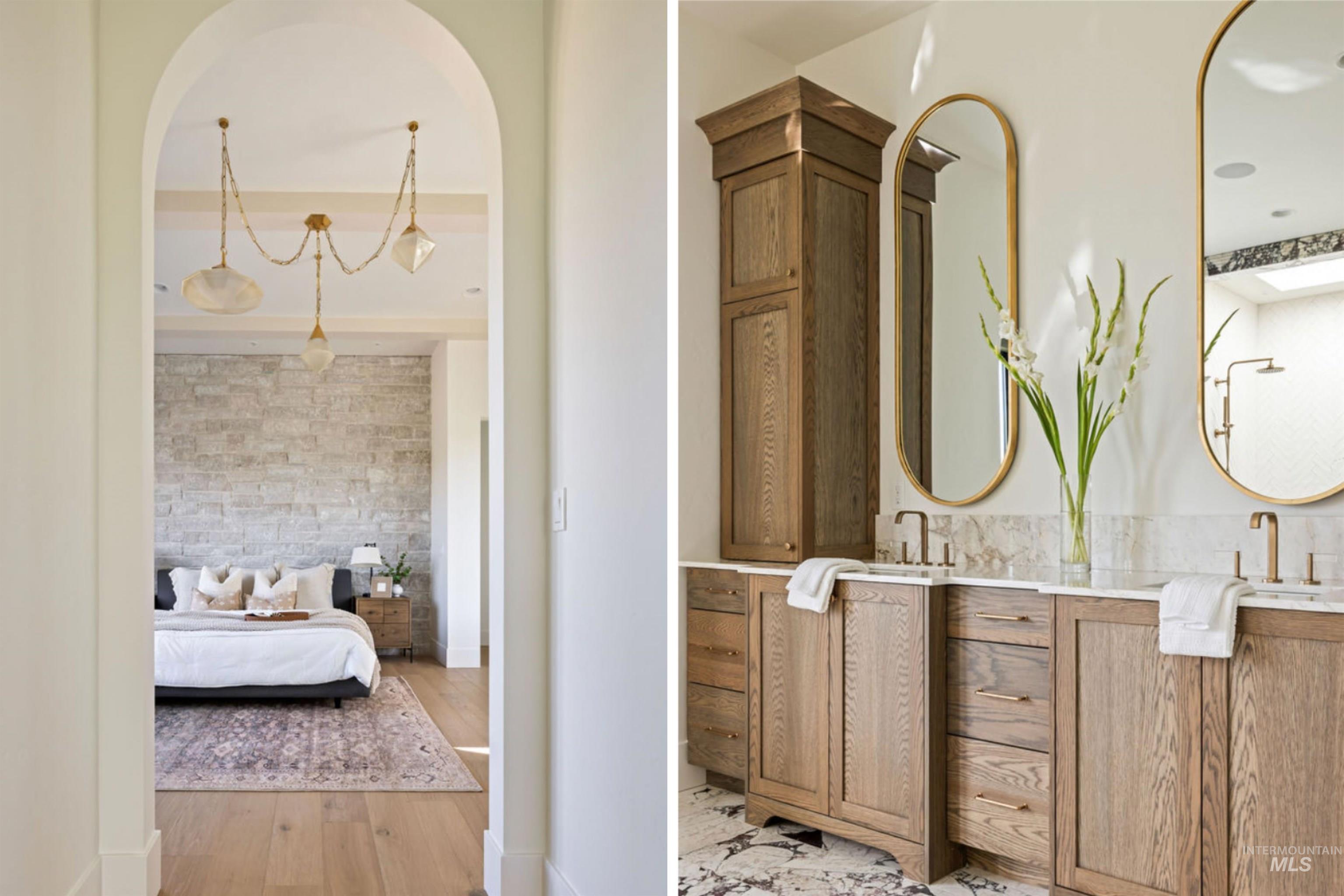 Full bathroom featuring double vanity, light wood-style floors, and ensuite bathroom