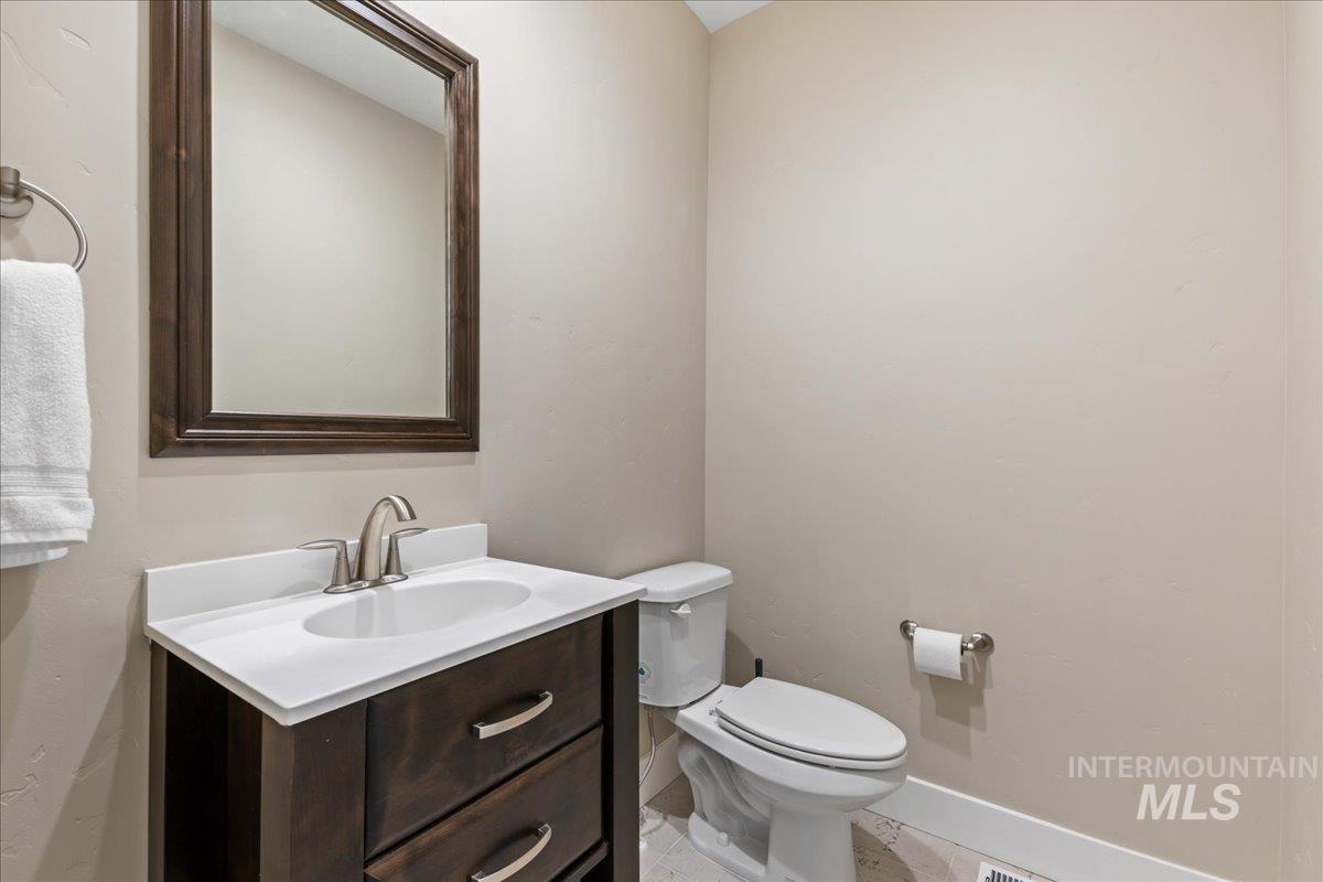 Bathroom with vanity and light tile patterned floors