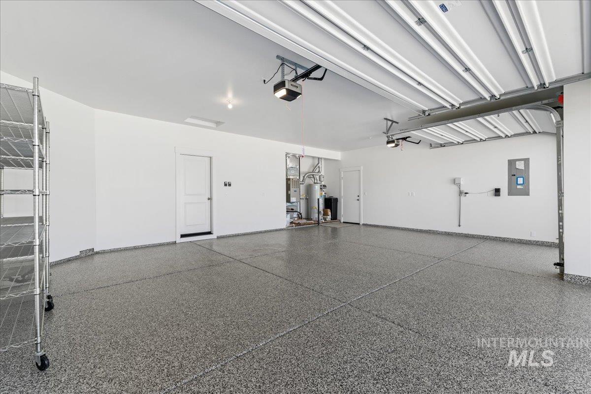 Garage featuring electric panel