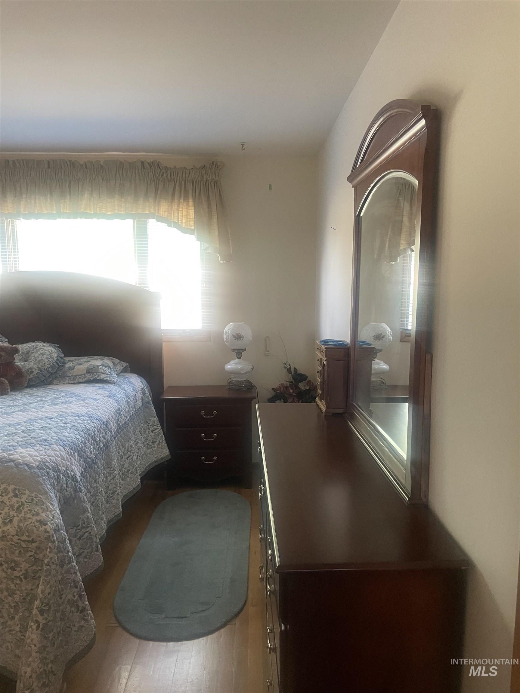 Bedroom featuring light wood-style flooring