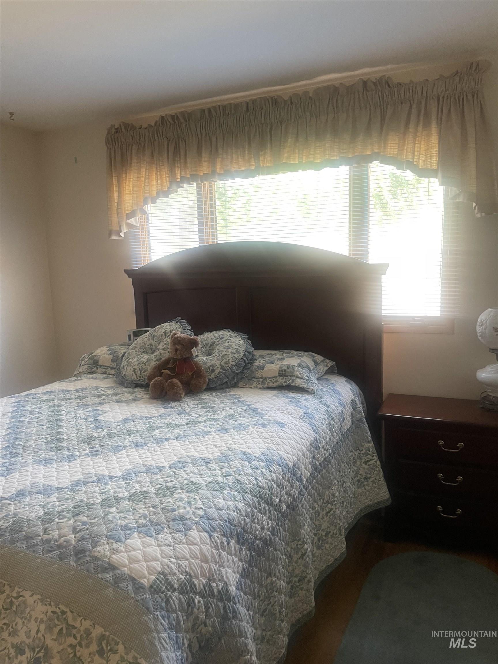 Bedroom featuring wood finished floors