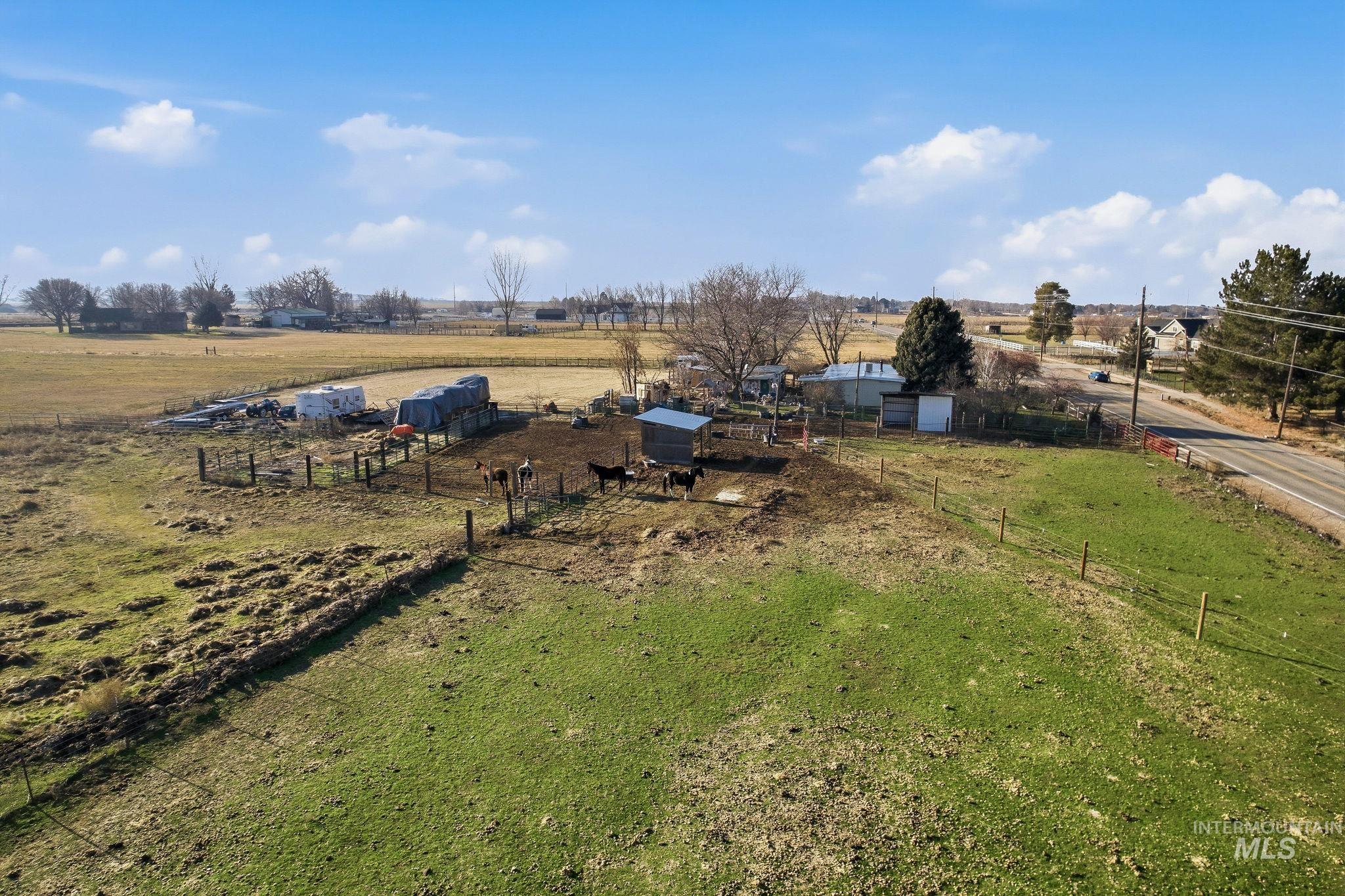 View of yard with a view of countryside and an outbuilding