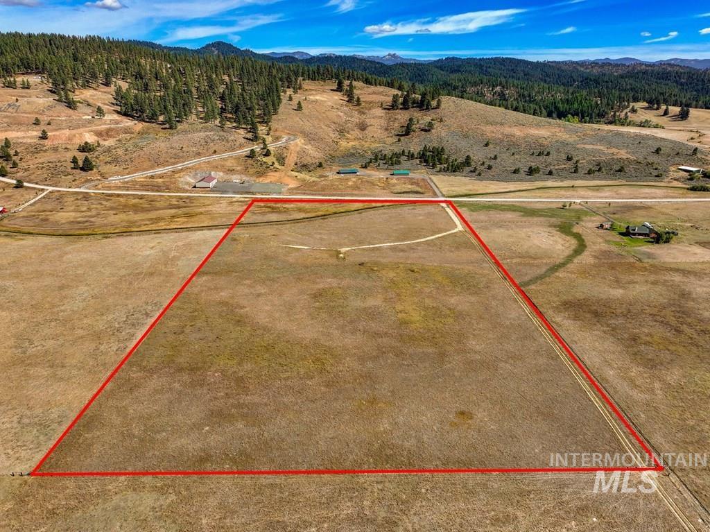 Aerial view of property's location featuring mountains and property boundaries highlighted