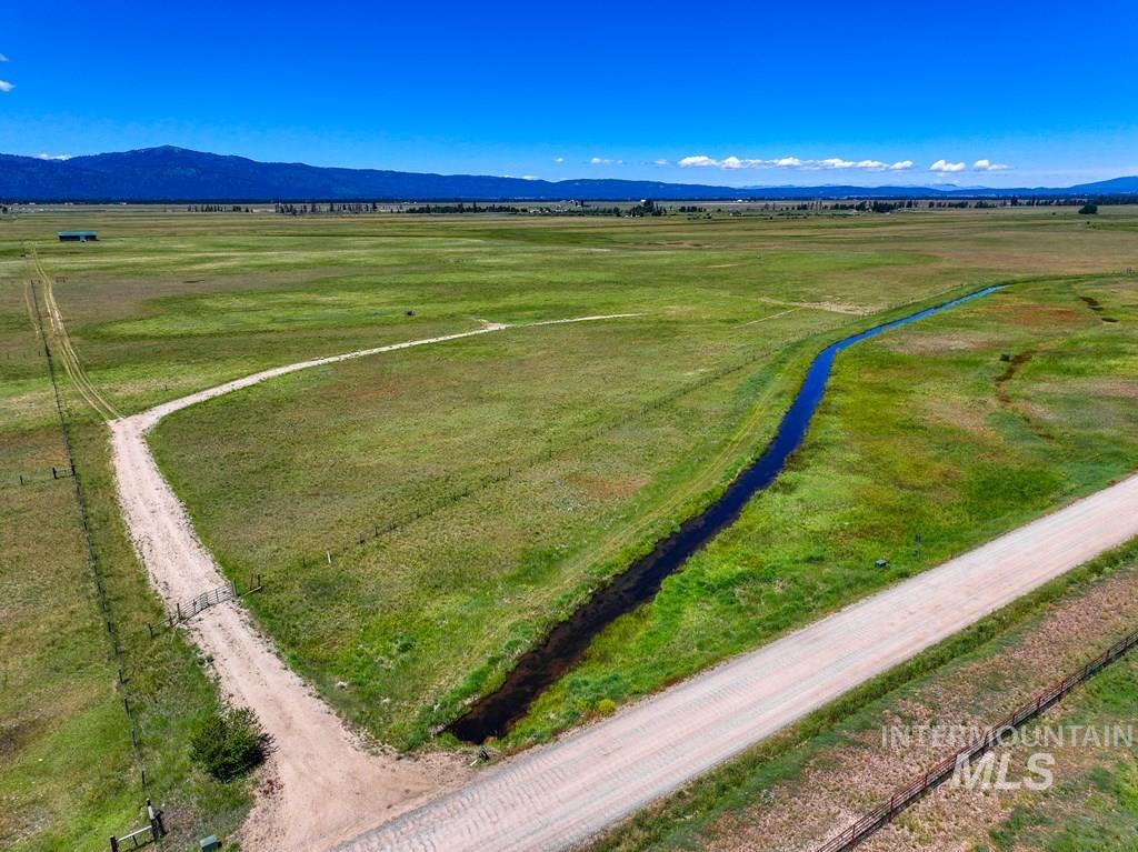 Aerial view of sparsely populated area with a mountainous background