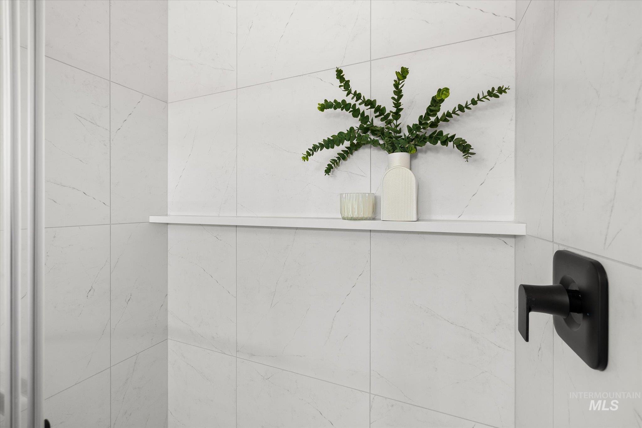 Bathroom view of tiled shower