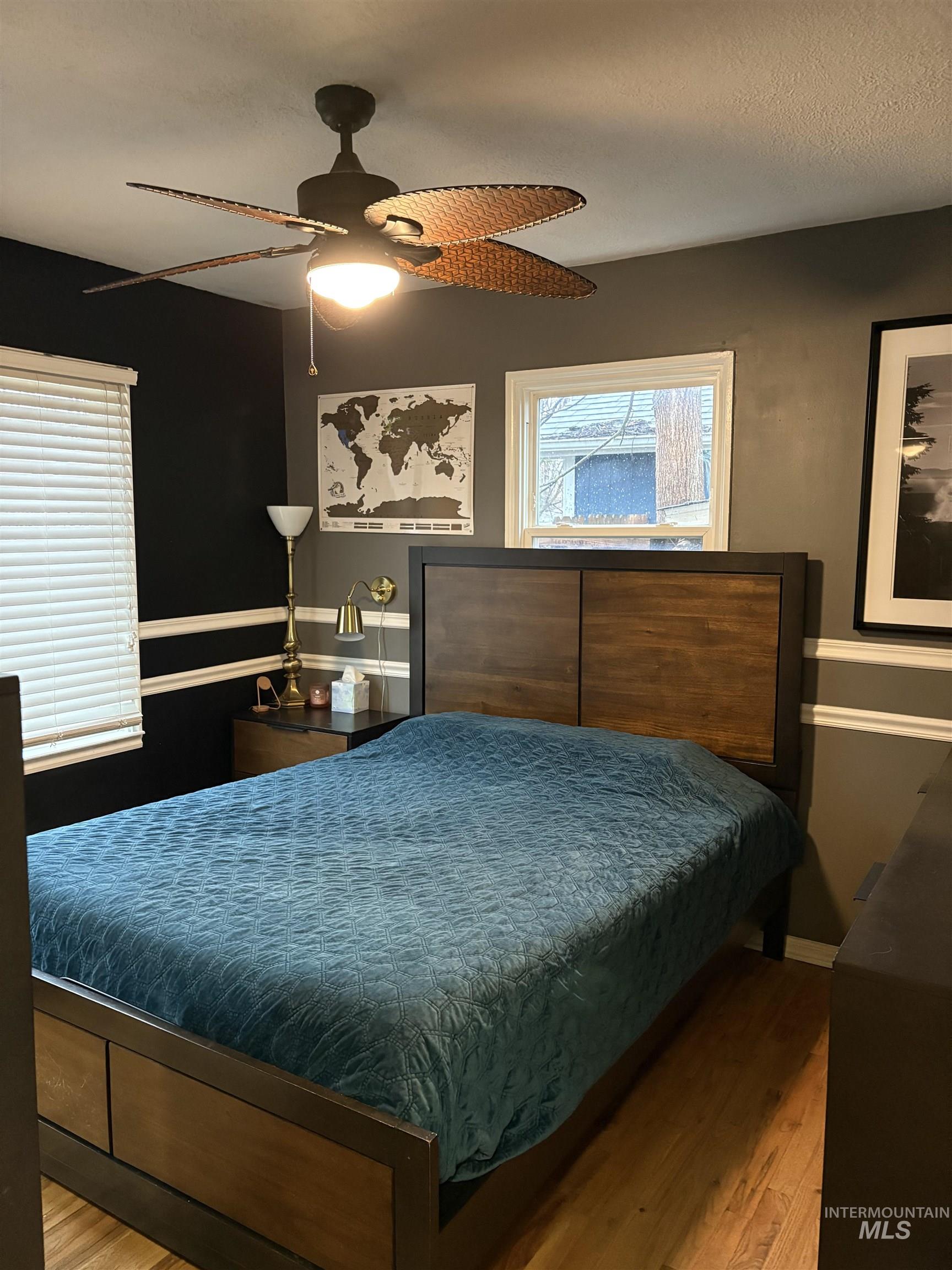 Bedroom featuring light wood finished floors and ceiling fan