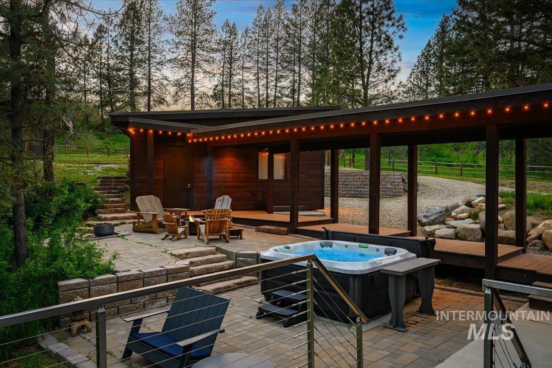 View of patio / terrace with a fire pit