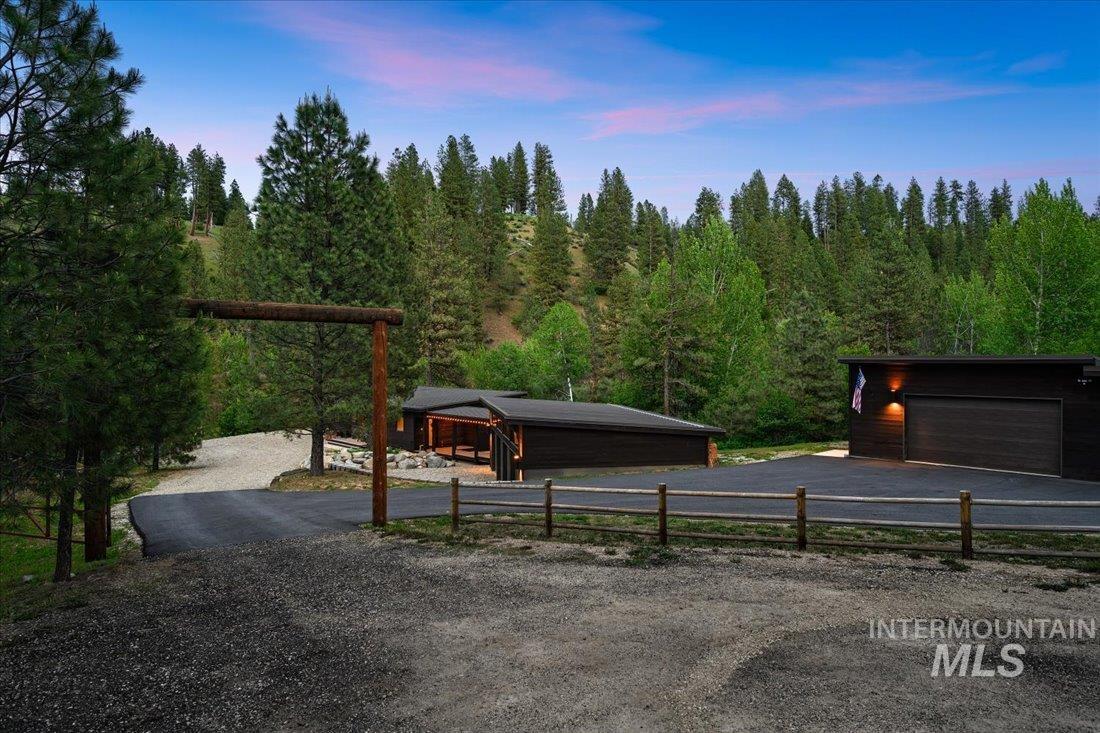 View of street featuring a forest view