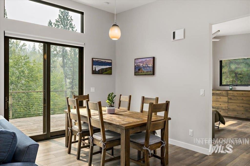 Dining space with light wood-type flooring