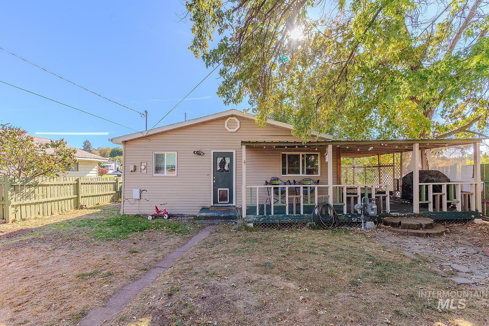 View of front of house featuring a deck