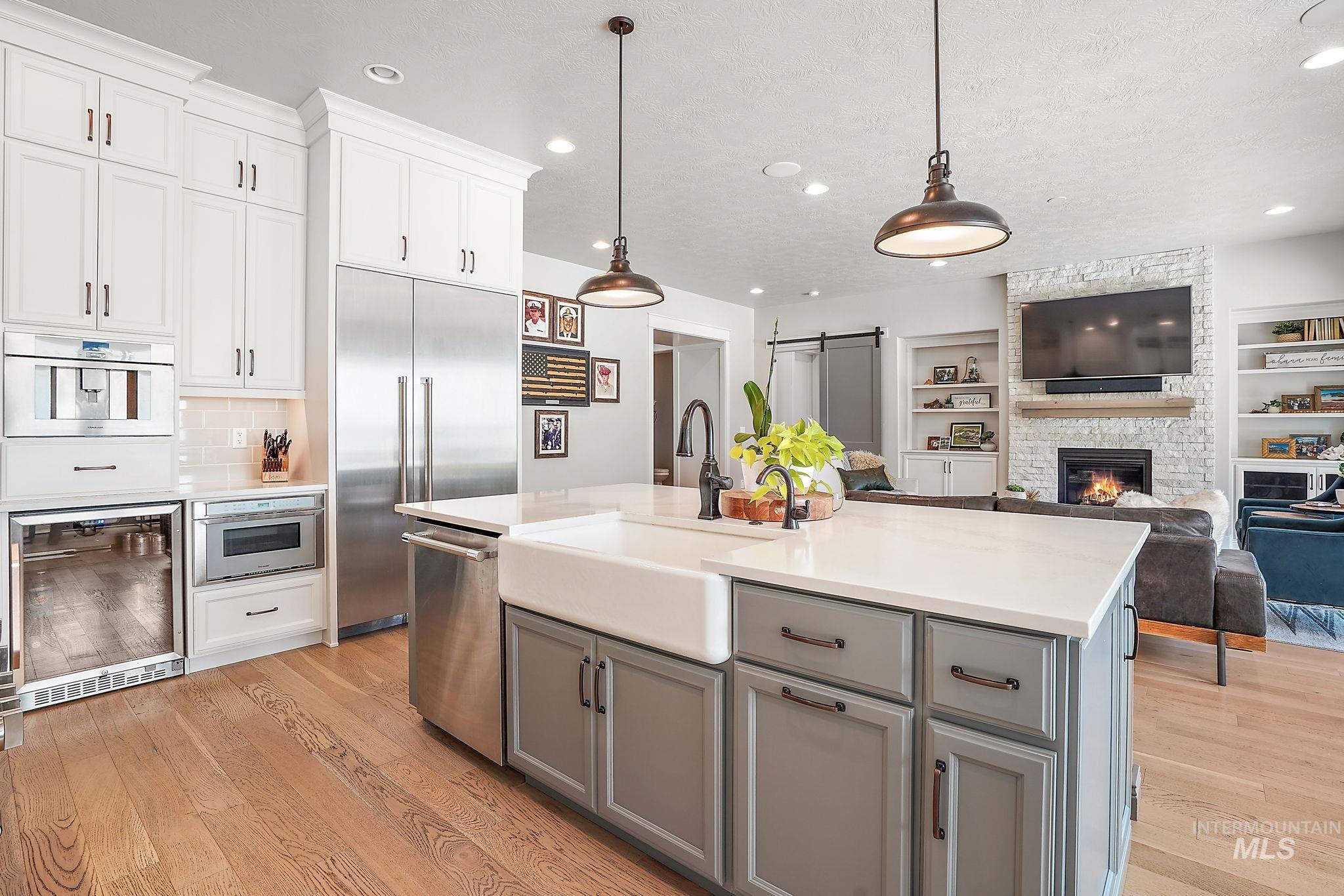 Built-in Thermador Fridge & Freezer. Small beverage fridge & Thermador built-in coffee barista