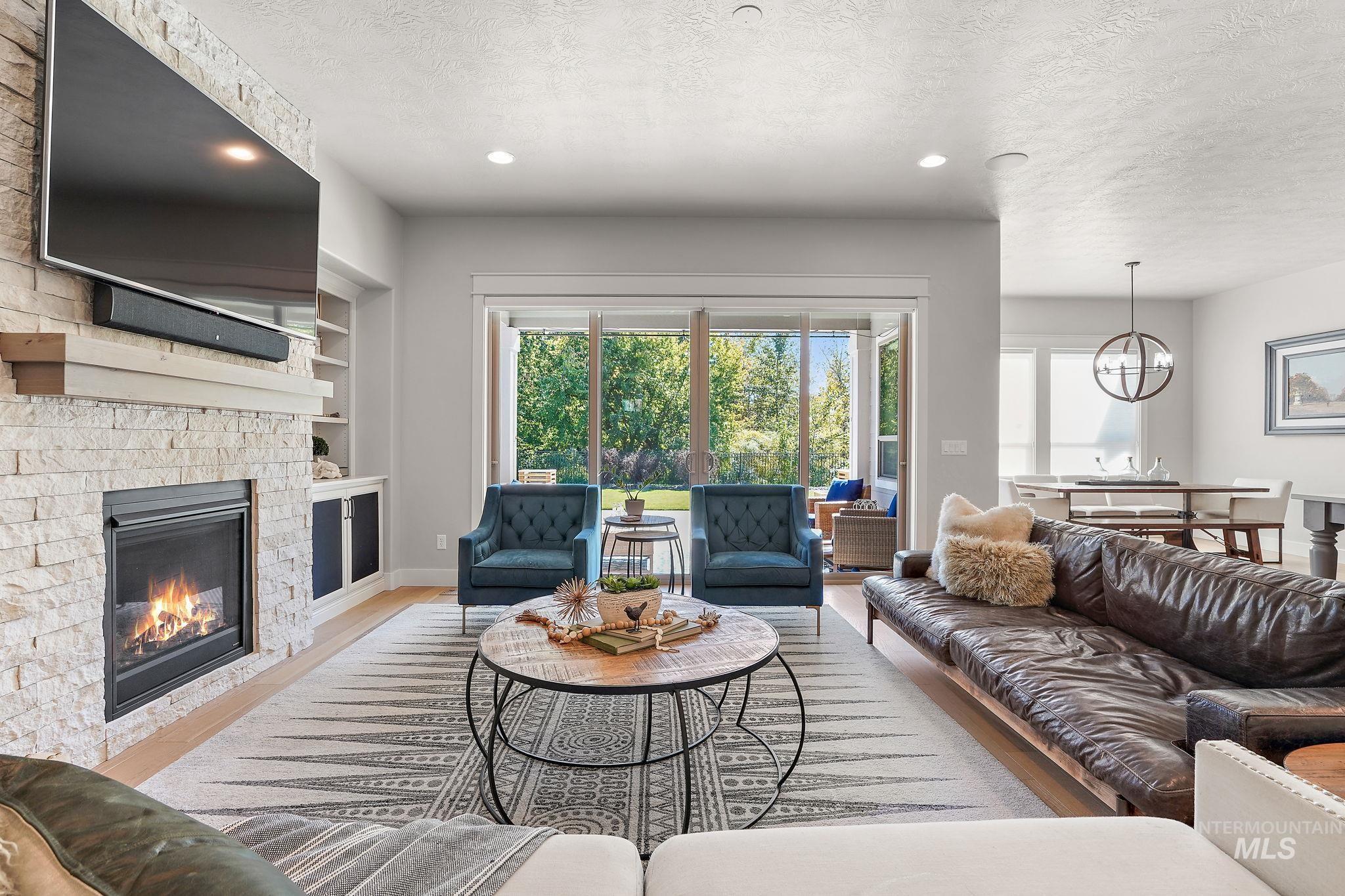 Living room with large quad slider opening to your covered proch!