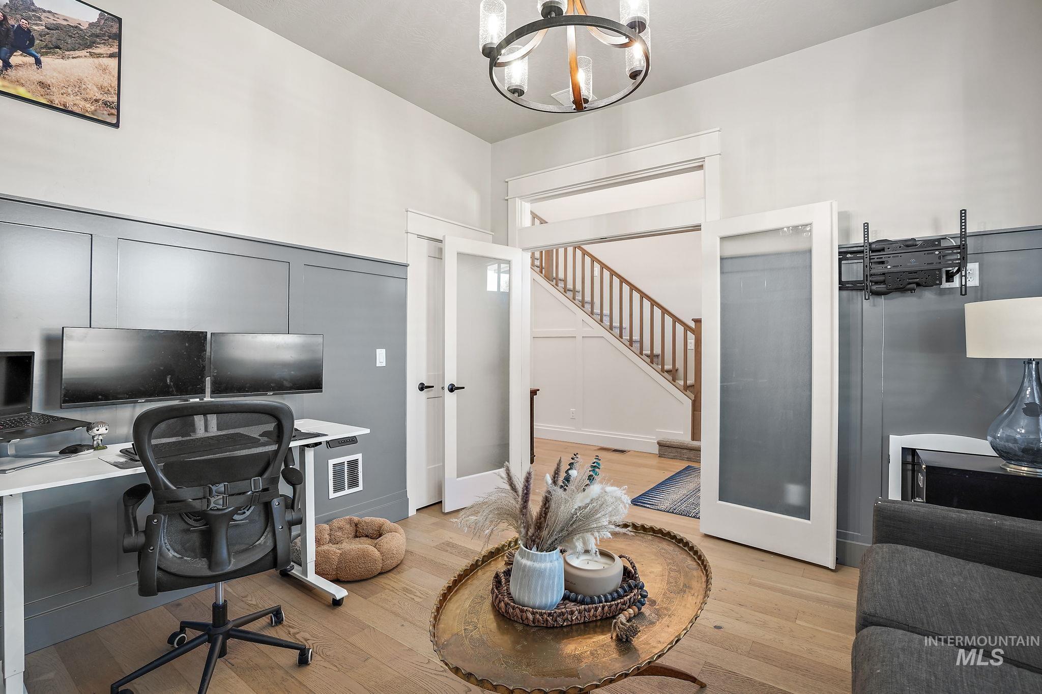 Main level office with privacy french doors