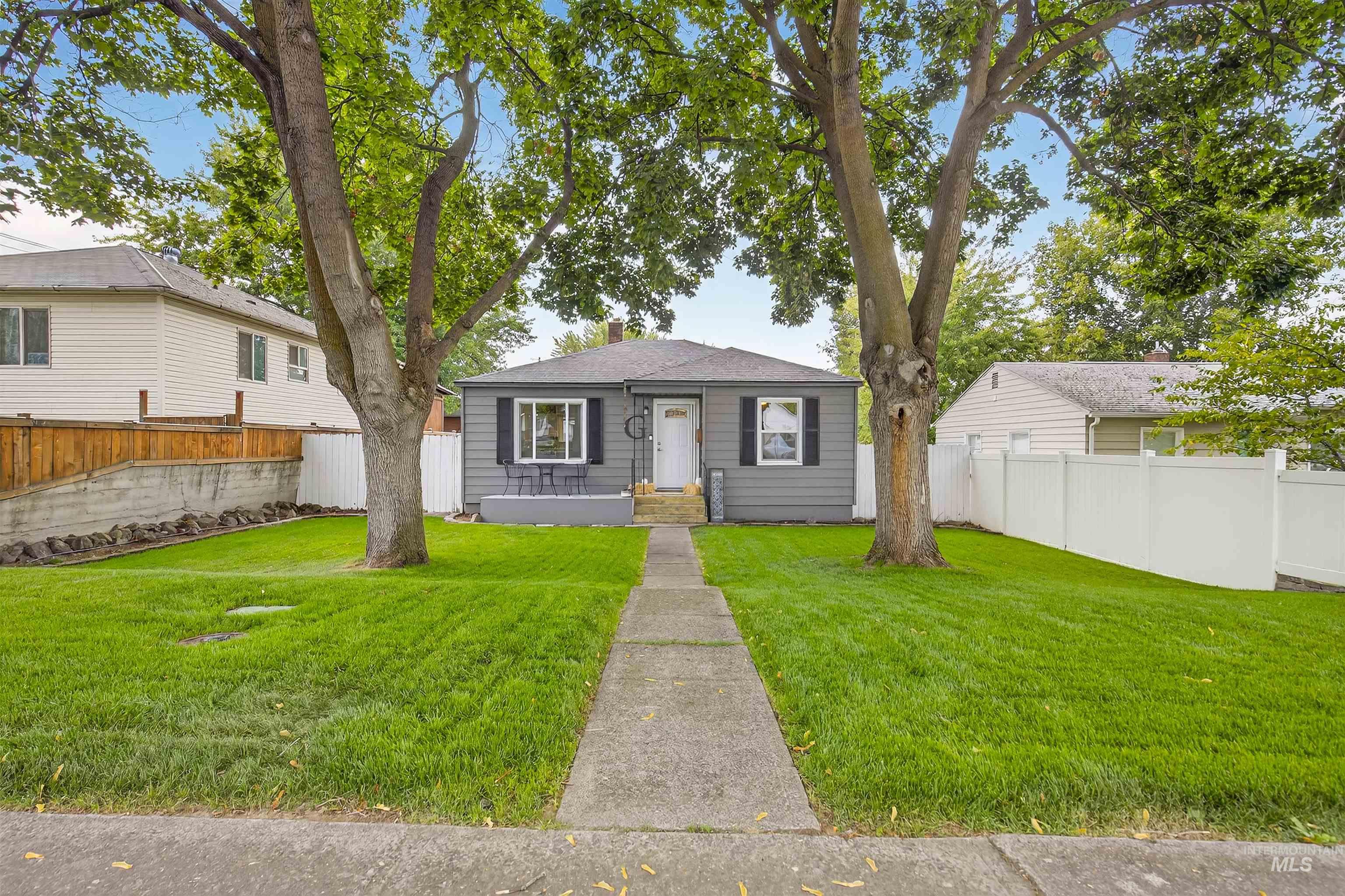 Bungalow-style house with a chimney