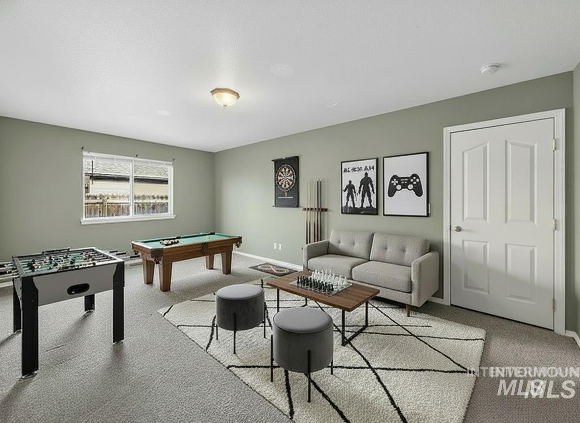 Rec room featuring billiards and carpet flooring