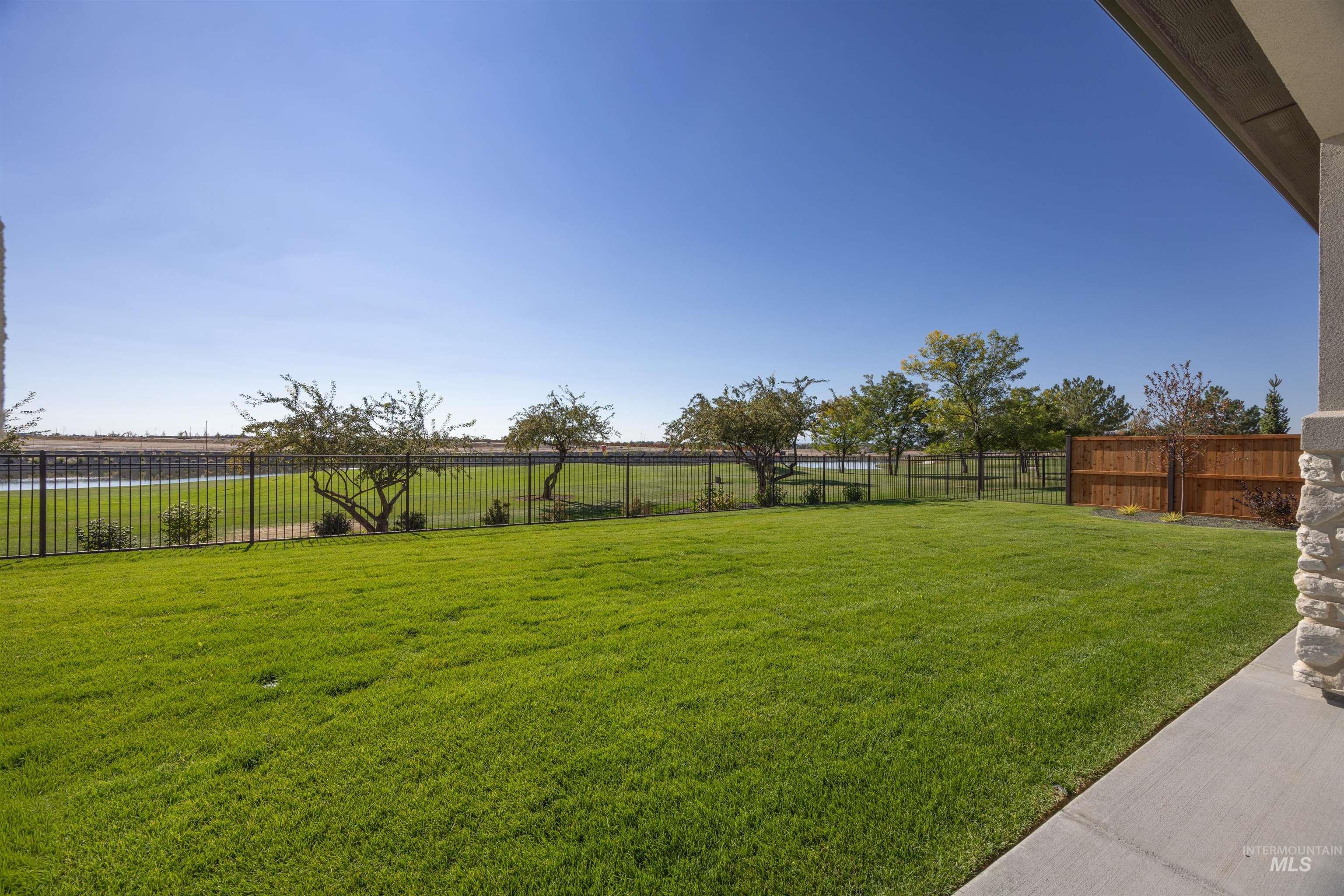 View of fenced backyard