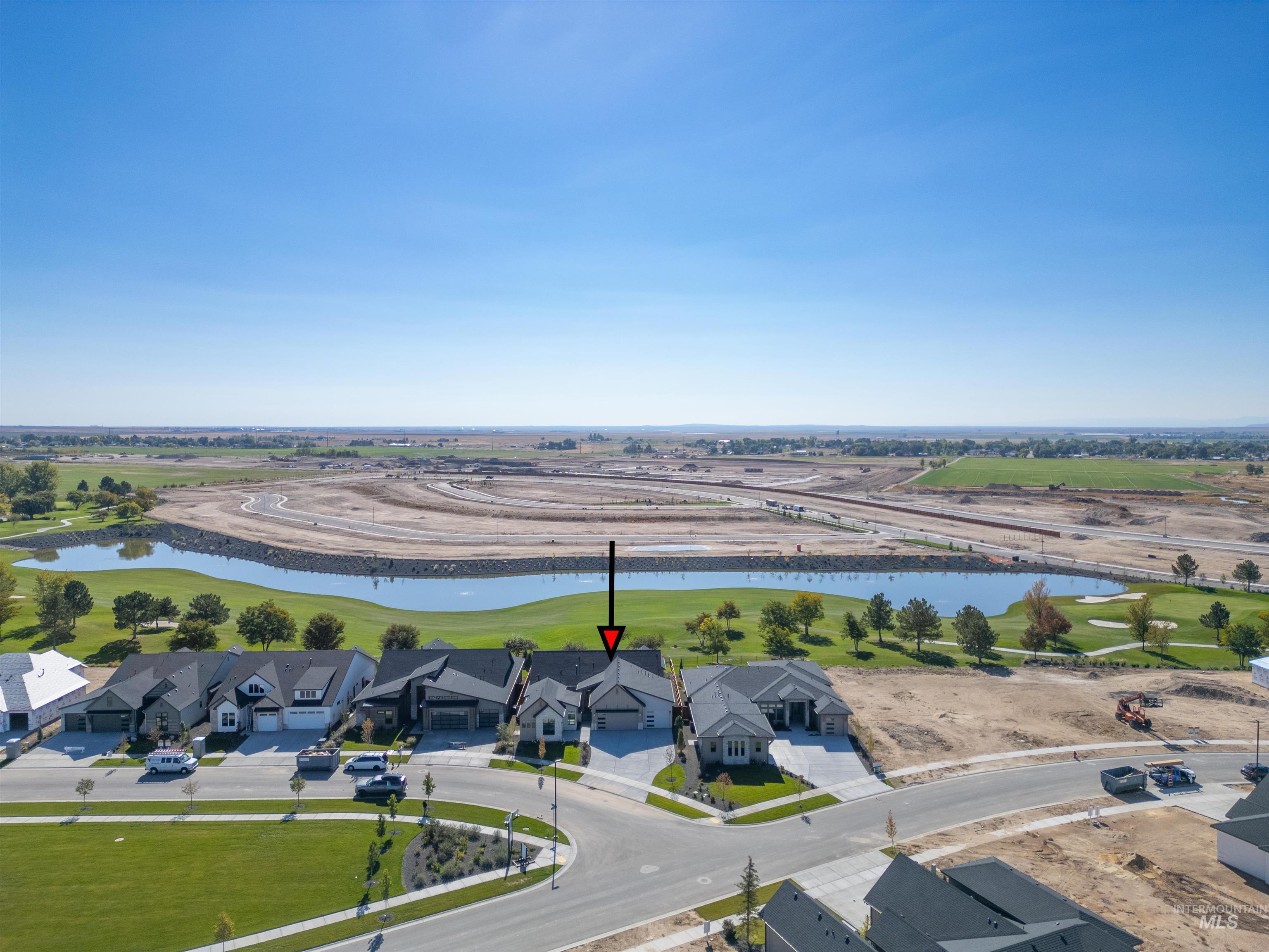 Aerial view of residential area with a nearby body of water