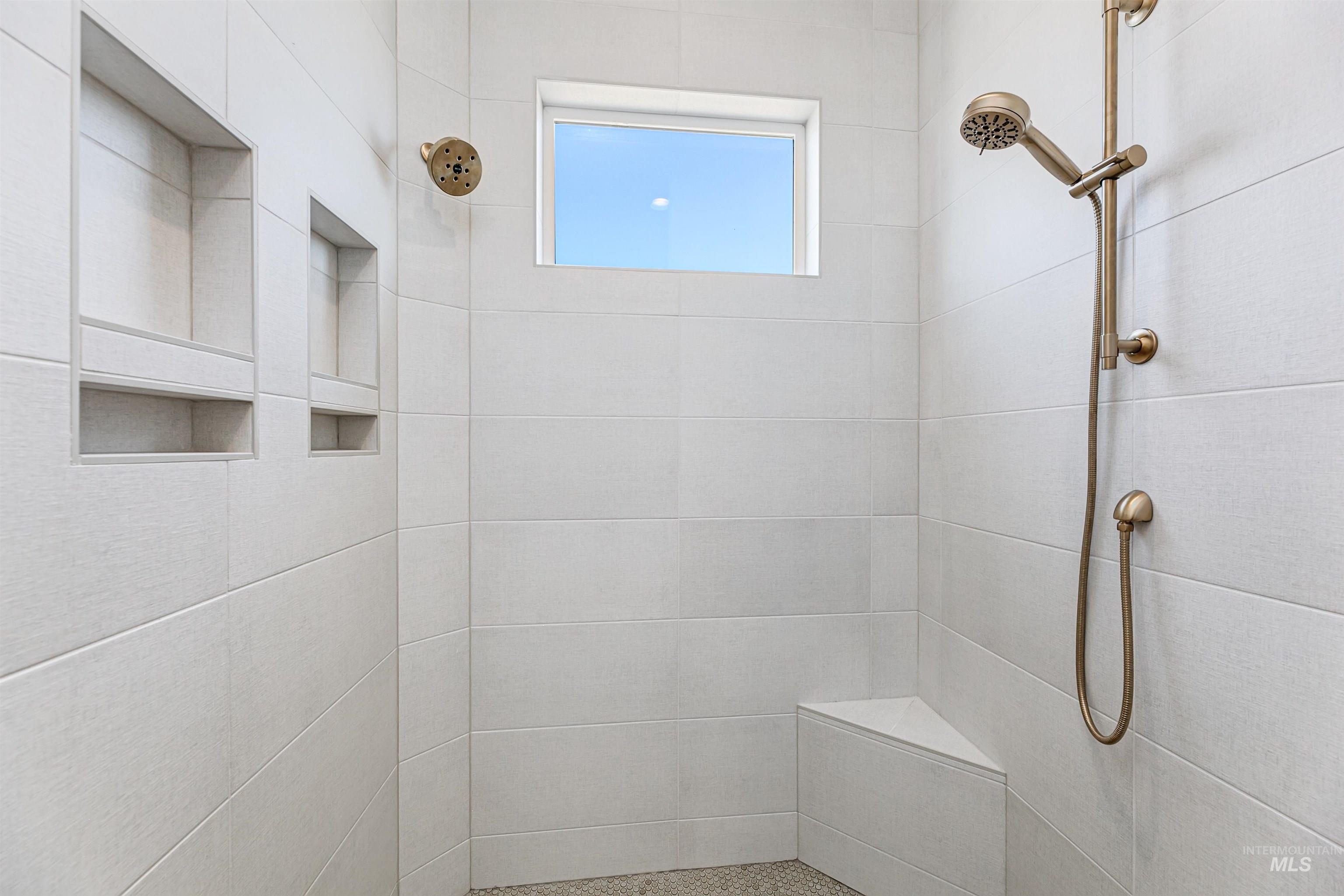 Bathroom featuring tiled shower