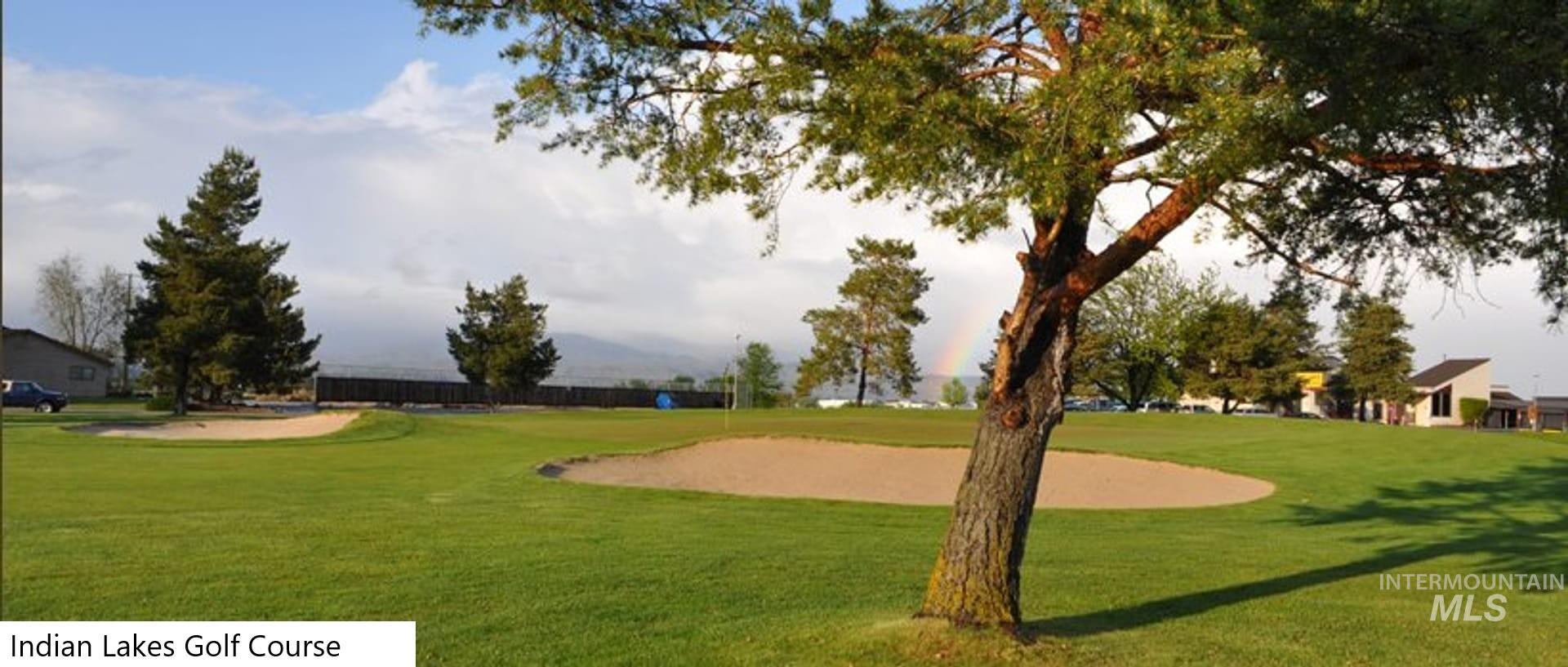 View of home's community featuring a lawn