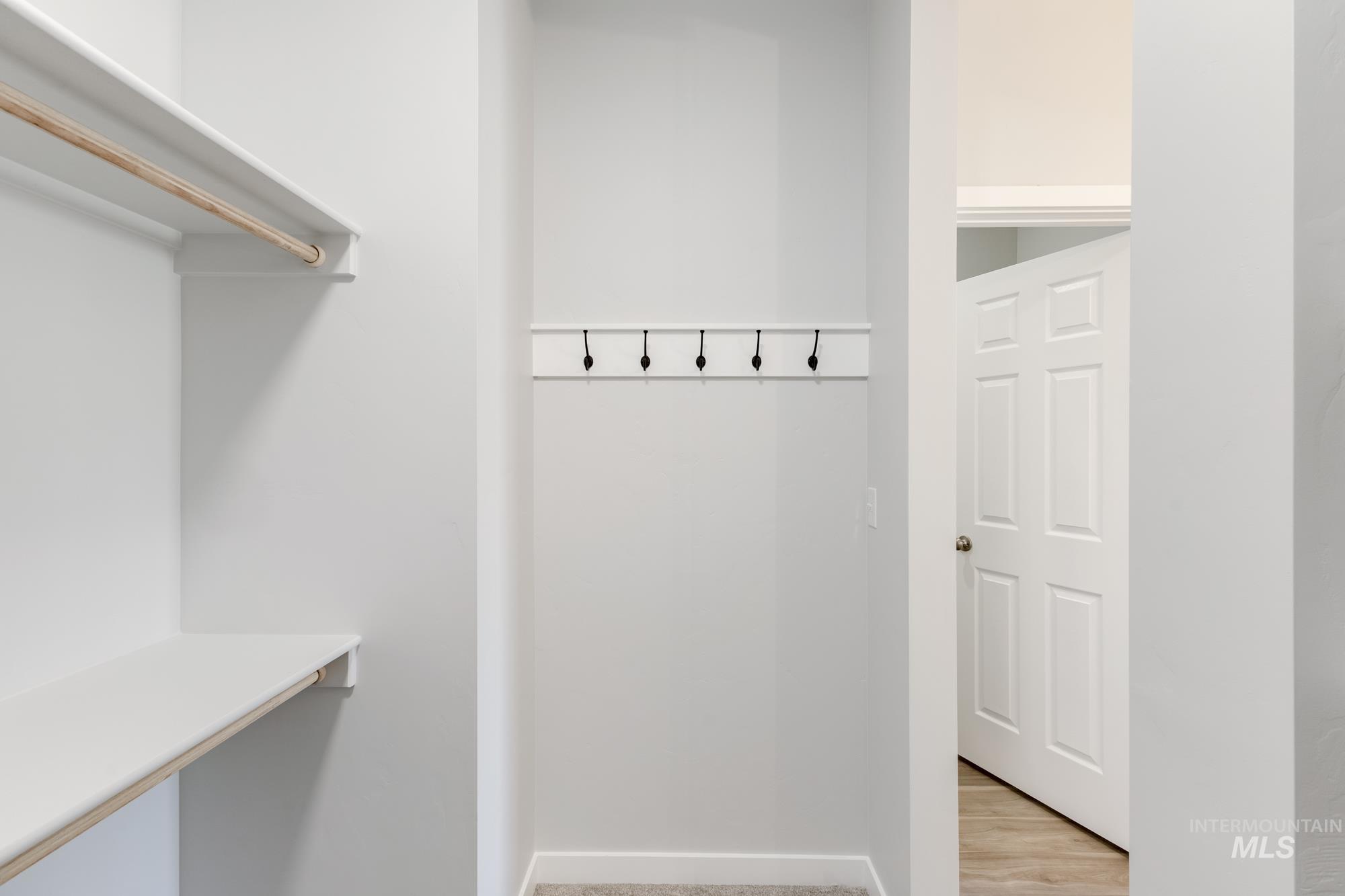 Mudroom featuring baseboards