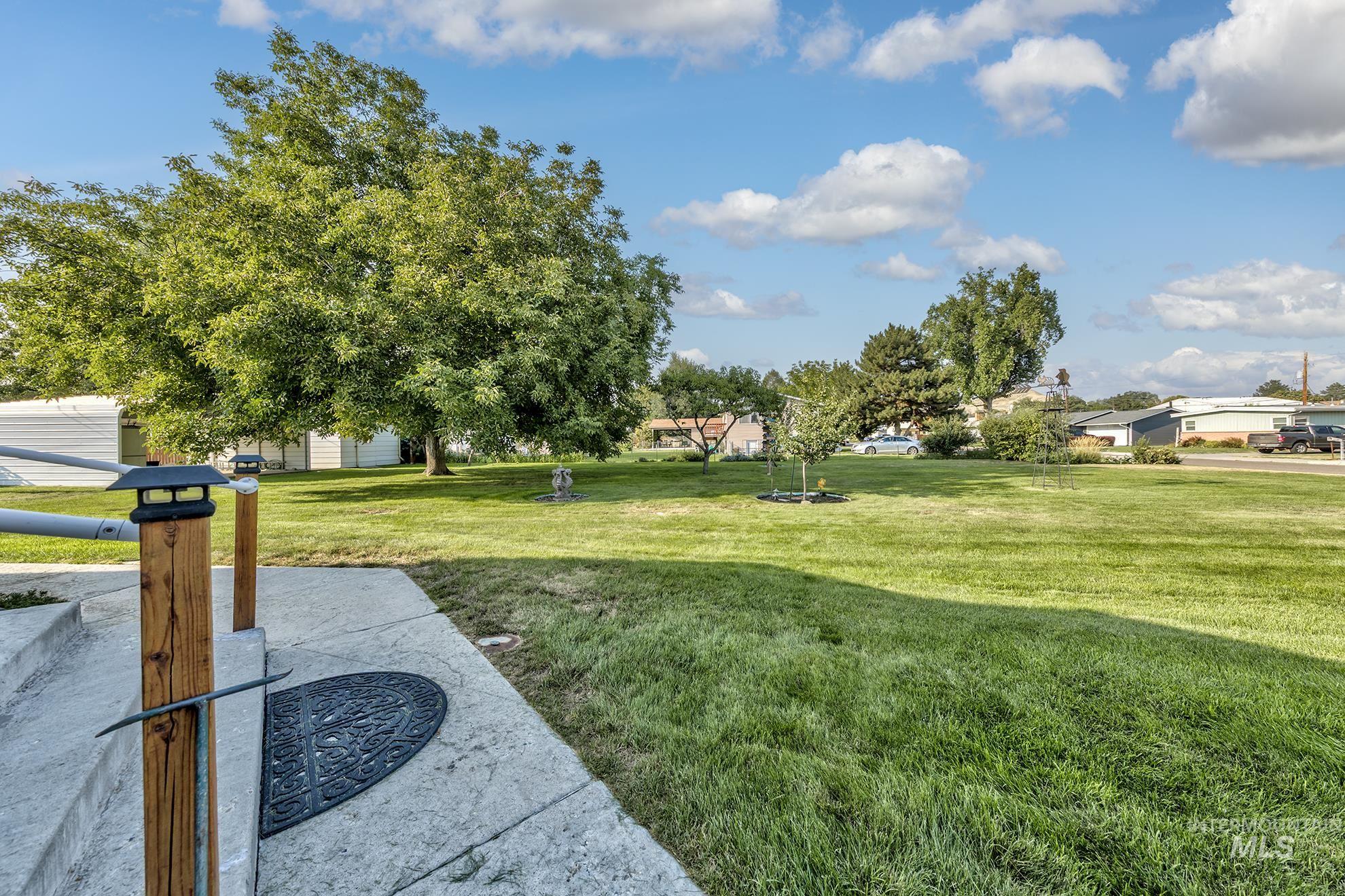 Surrounding community featuring a lawn