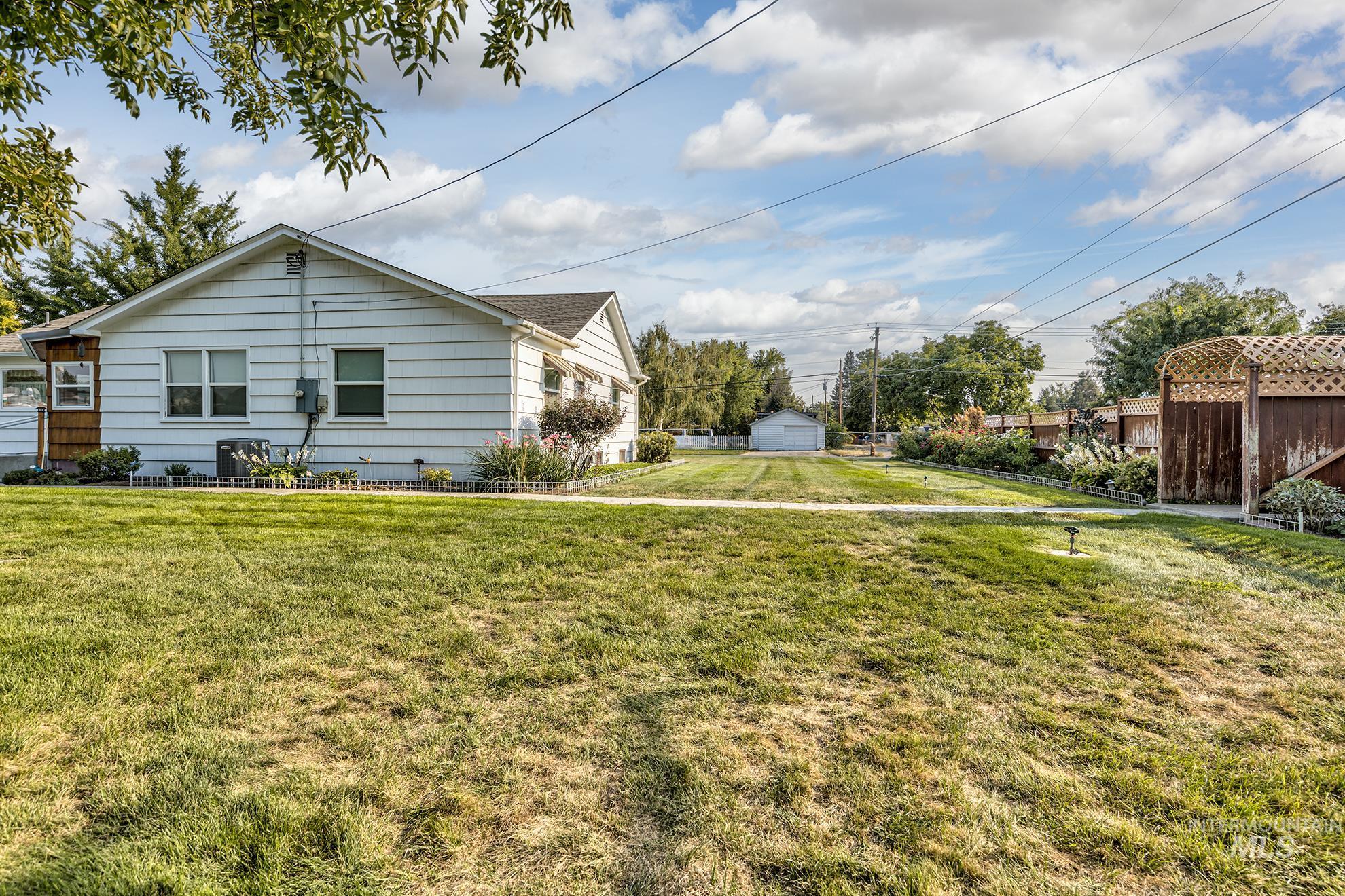 View of home's exterior featuring a cooling unit